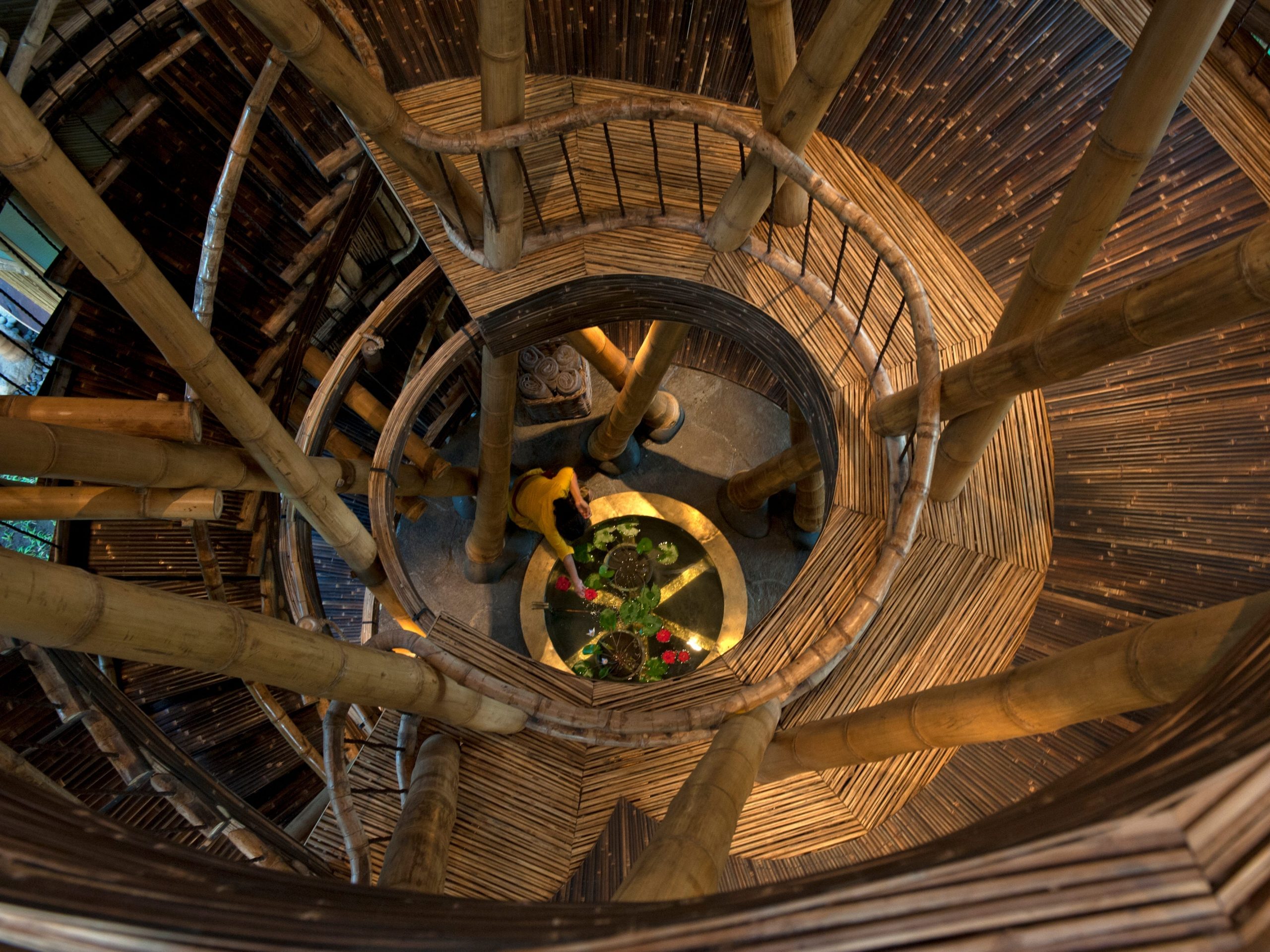 The staircase of the home winds up through the center of the structure