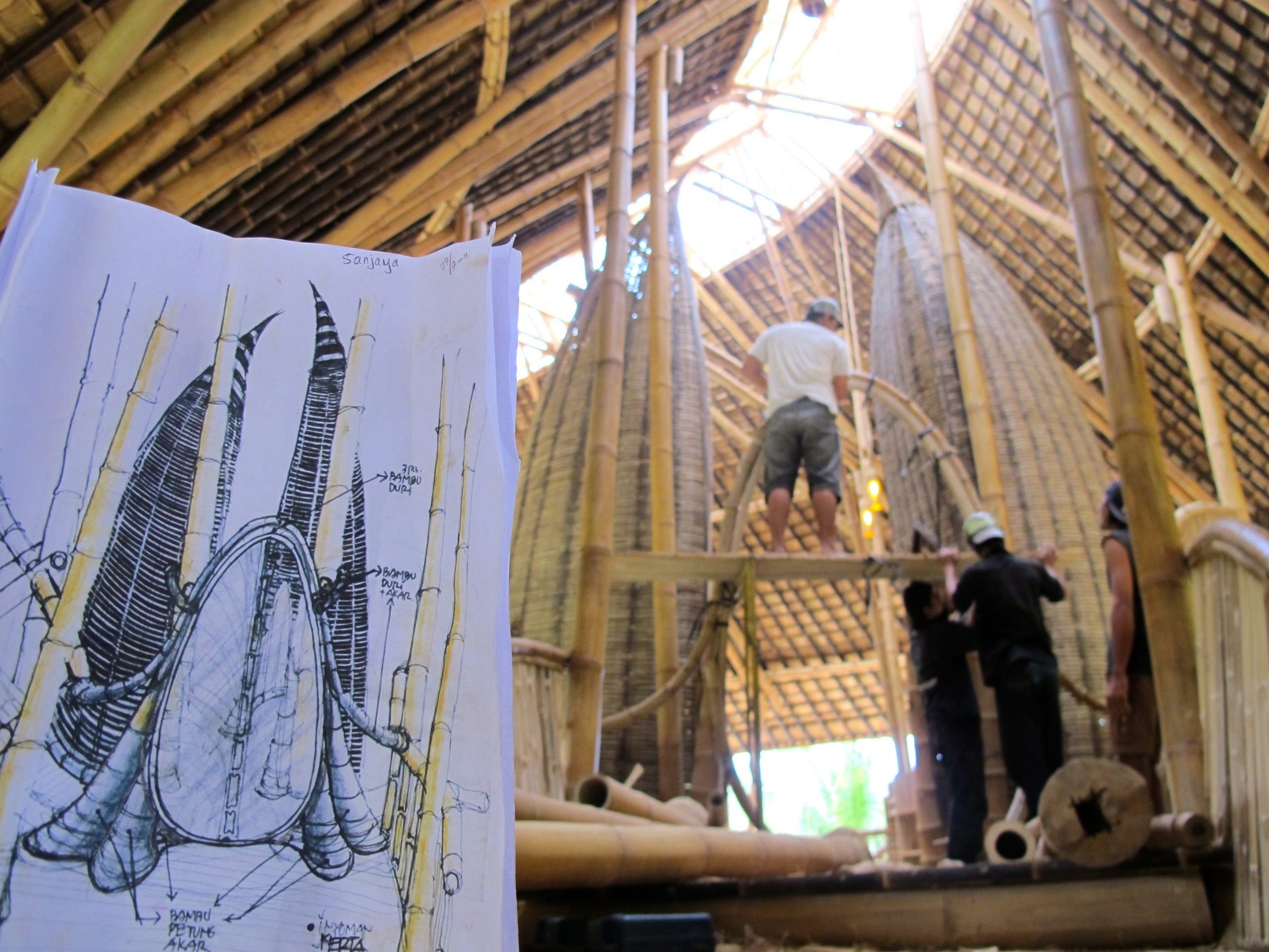 The sketch of an Ibuku home in comparison to the build process of the home