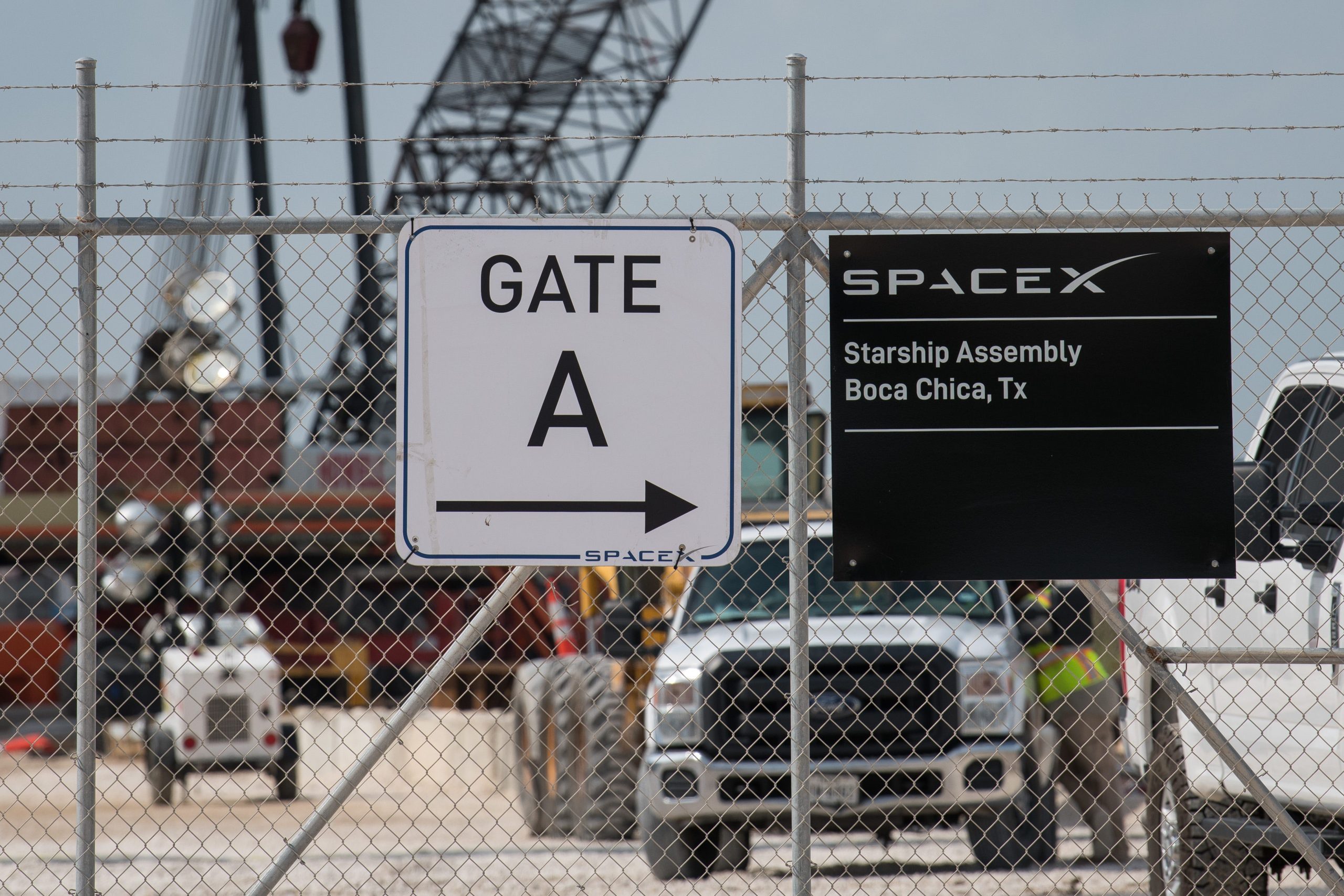 A gated entrance by a prototype of SpaceX's Starship spacecraft is seen at the company's Texas launch facility on September 28, 2019 in Boca Chica near Brownsville, Texas.