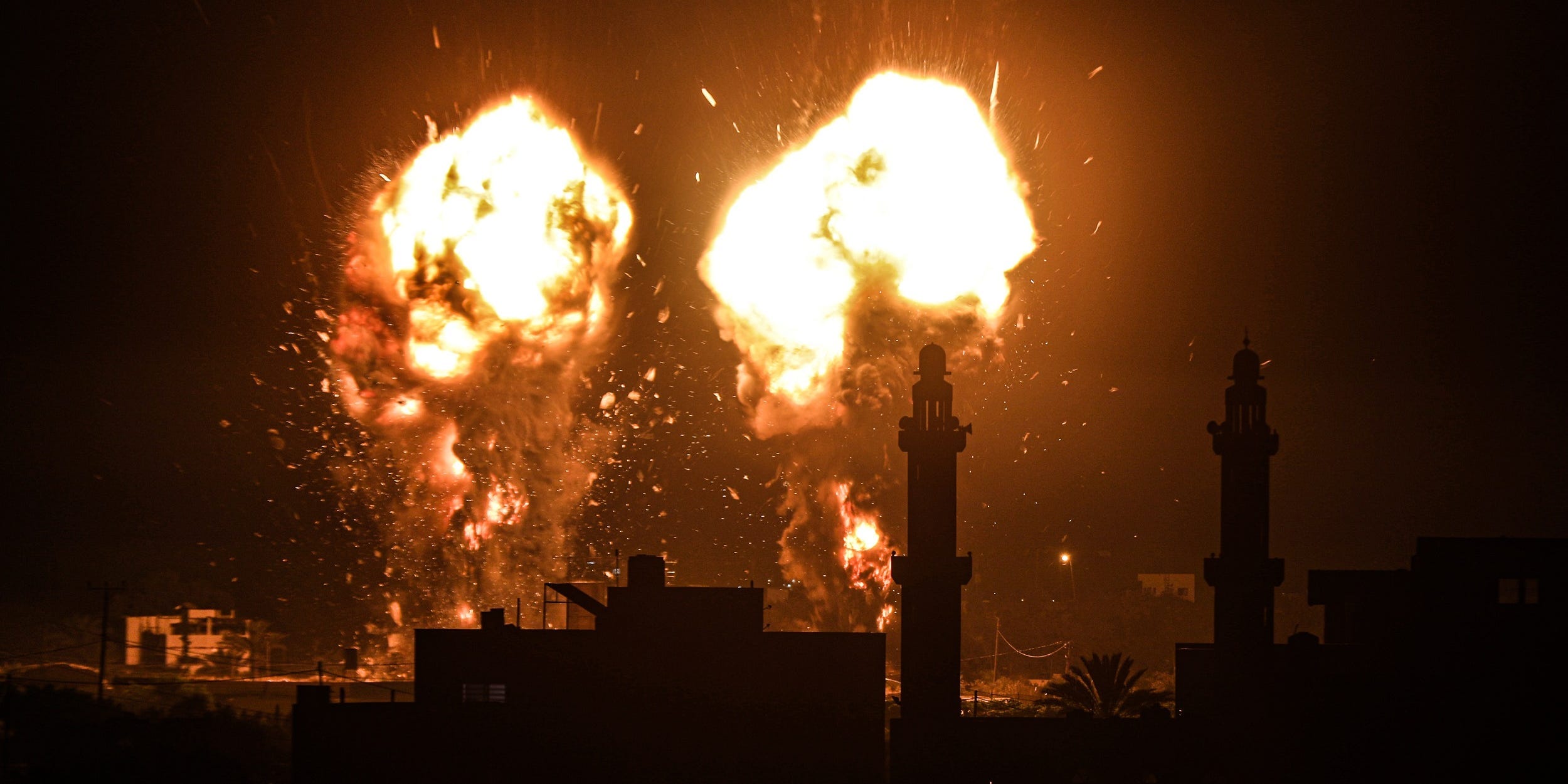 Flames are seen after an Israeli air strike hit Hamas targets in Gaza City, Gaza on June 15, 2021.