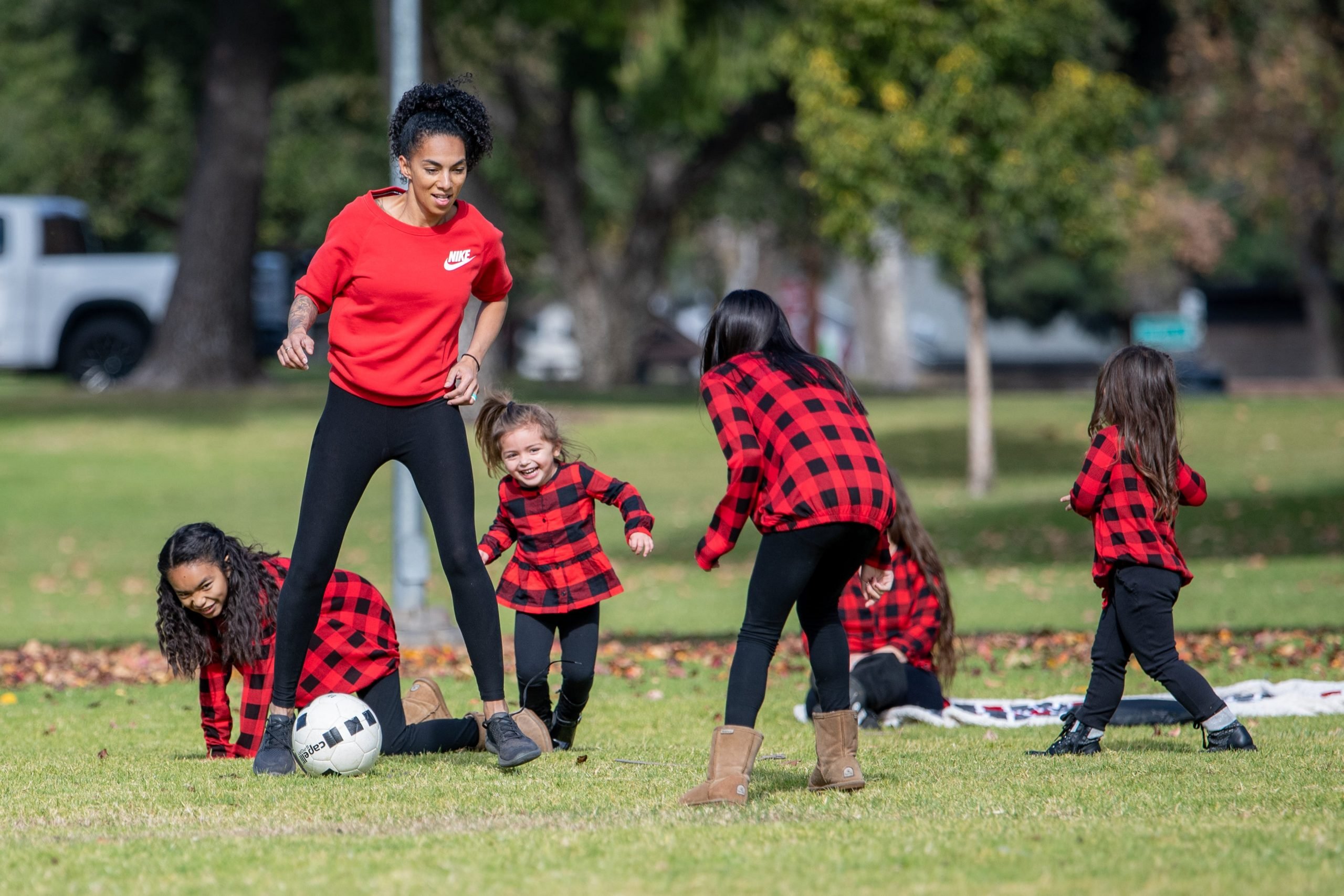 Lindsey Huie plays soccer with her five kids