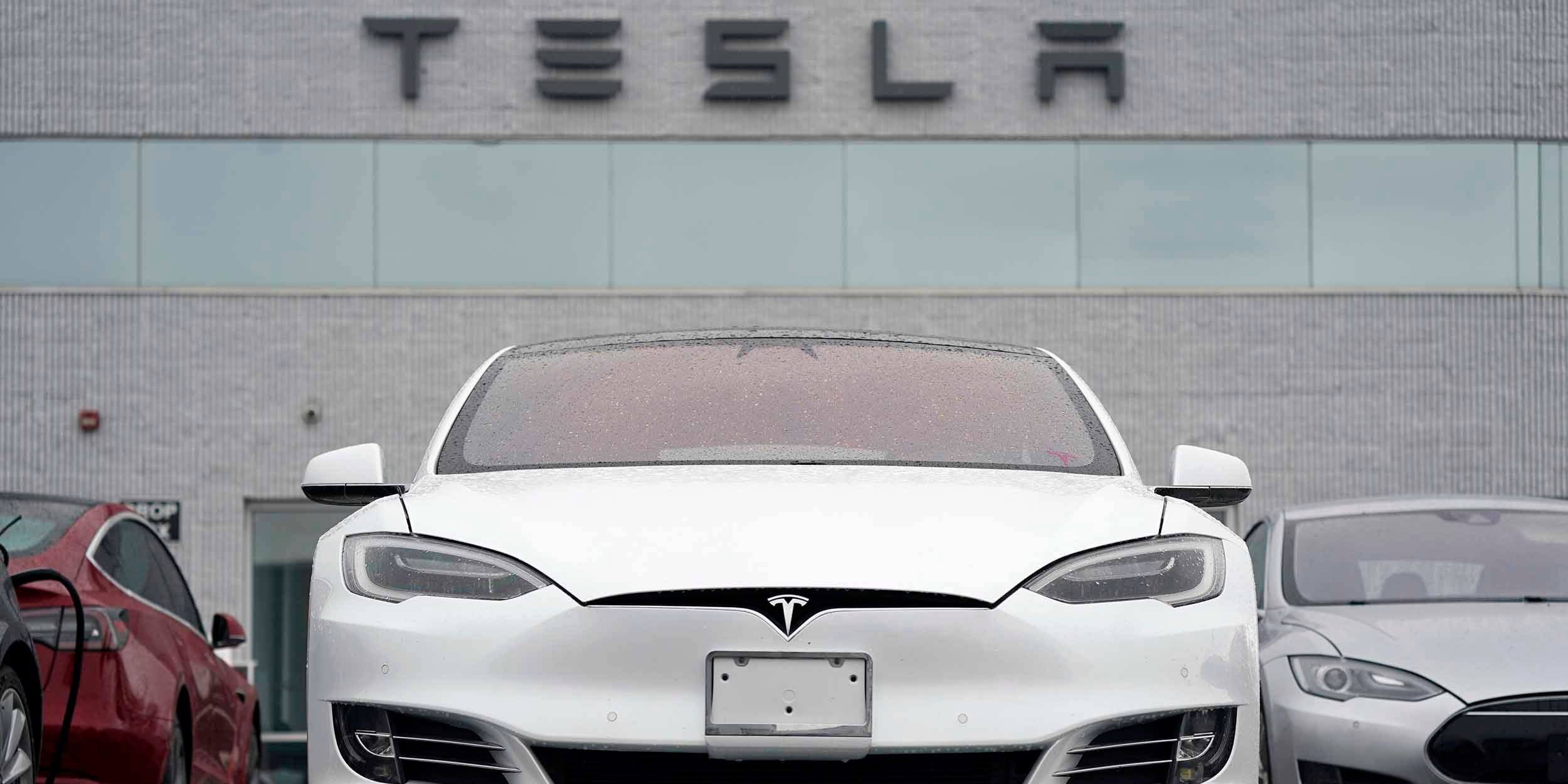 A white Tesla Model S is pictured at a Tesla facility in Littleton, Colorado.