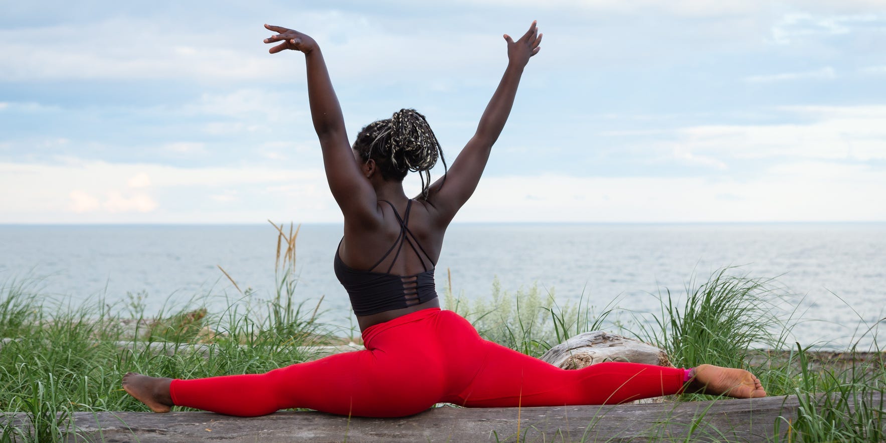 woman doing the front splits