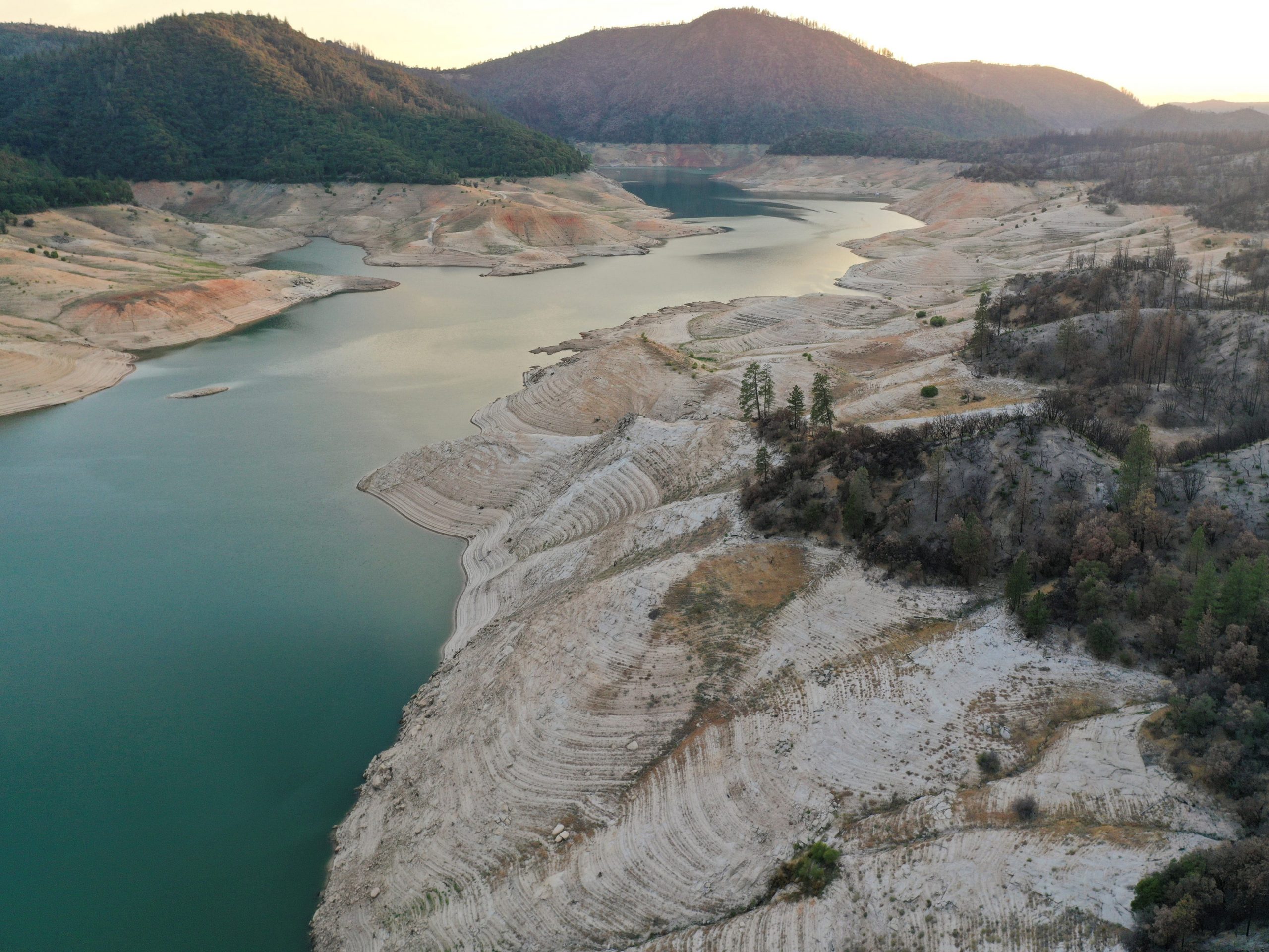 low water levels at lake oroville reveal bare shorelines