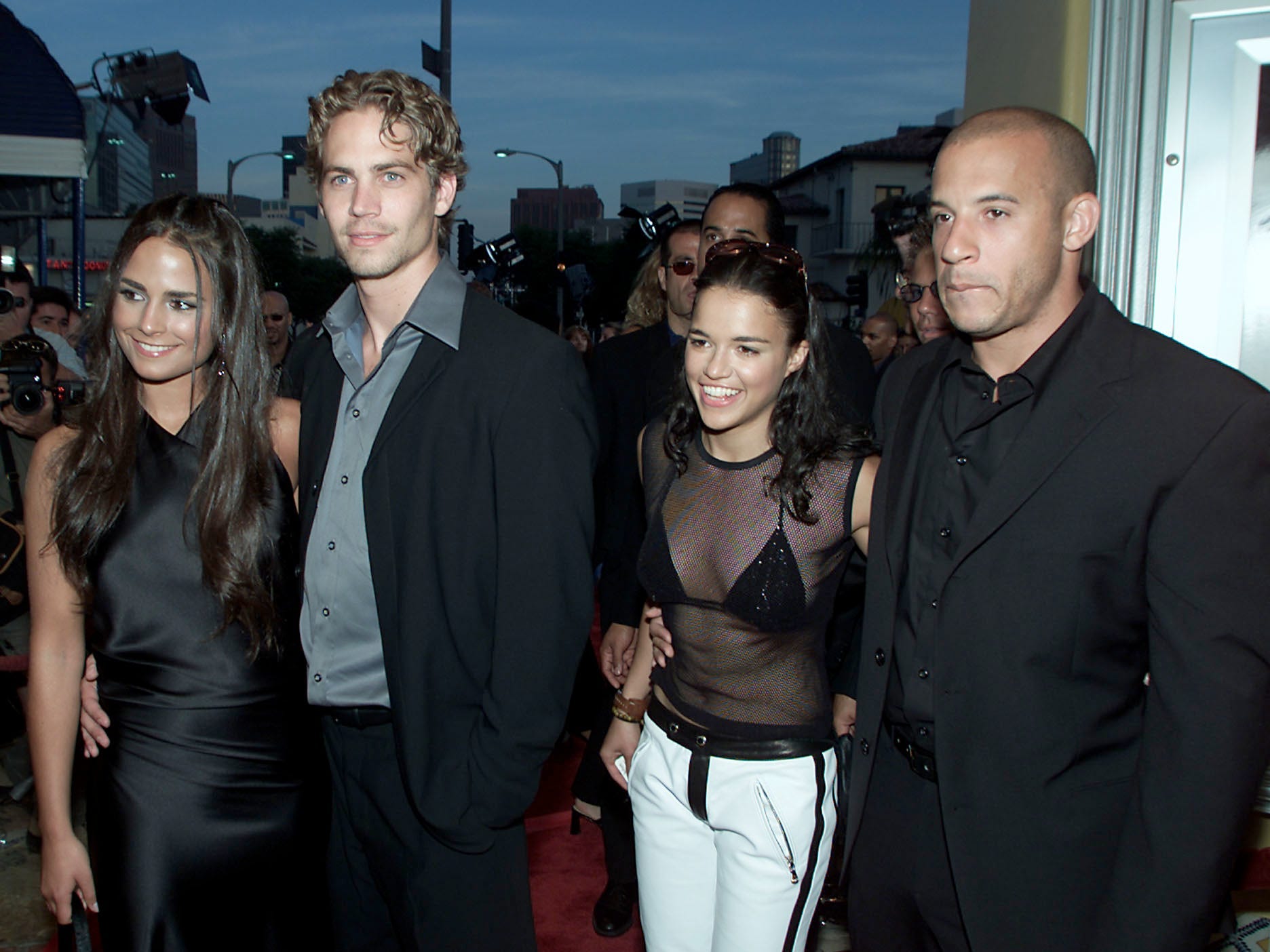 Jordana Brewster, Paul Walker, Michelle Rodriguez, and Vin Diesel attend "The Fast and the Furious" premiere at Mann Village Theatre in Los Angeles, California.
