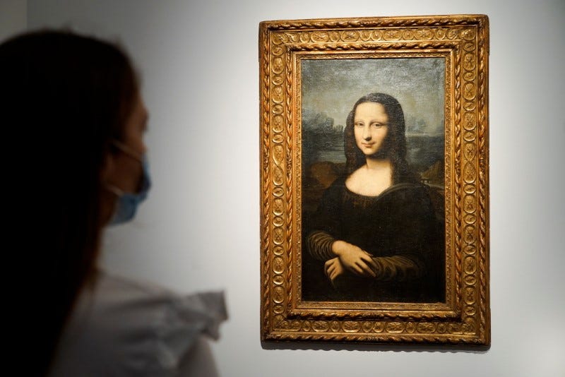 A guest a Christie's auction house views a "Mona Lisa" replica