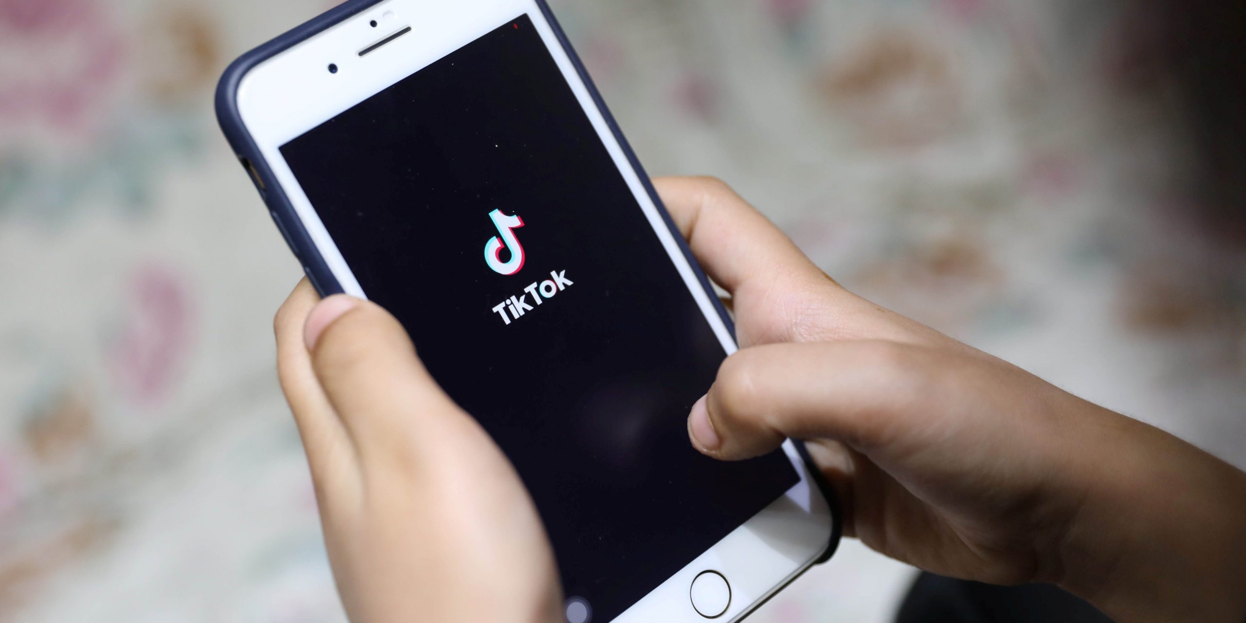 A mobile phone running the TikTok app in Cairo, Egypt.