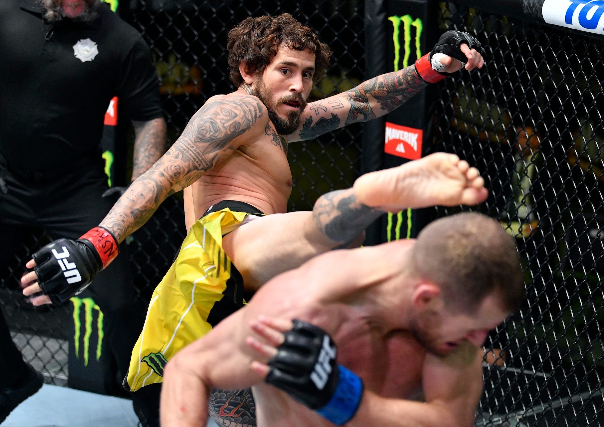 Marlon Vera throws a kick at a retreating Davey Grant during UFC Vegas 29.