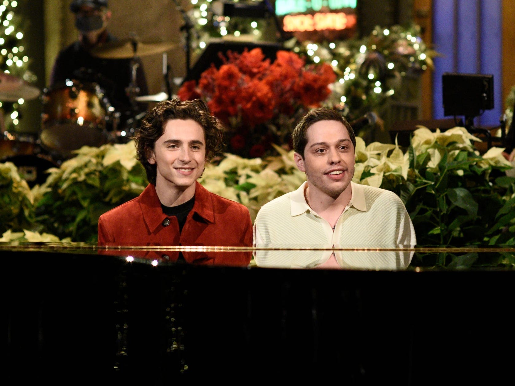 timothee chalamet and pete davidson sitting at the piano at studio 8h filming SNL