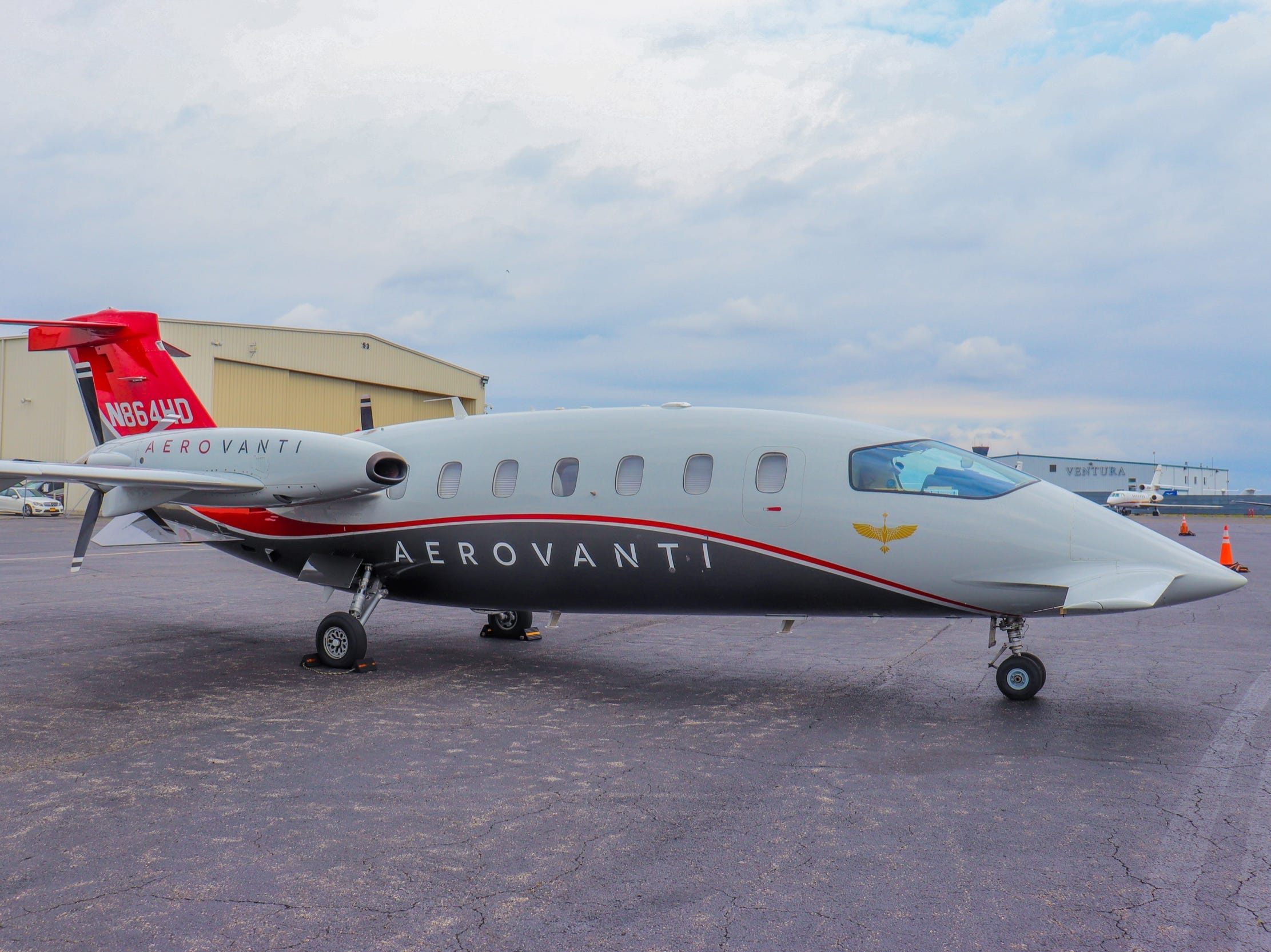 An side view of AeroVanti's Piaggio P.180 Avanti - AeroVanti's Piaggio P.180 Avanti Demonstration Private Aircraft Flight