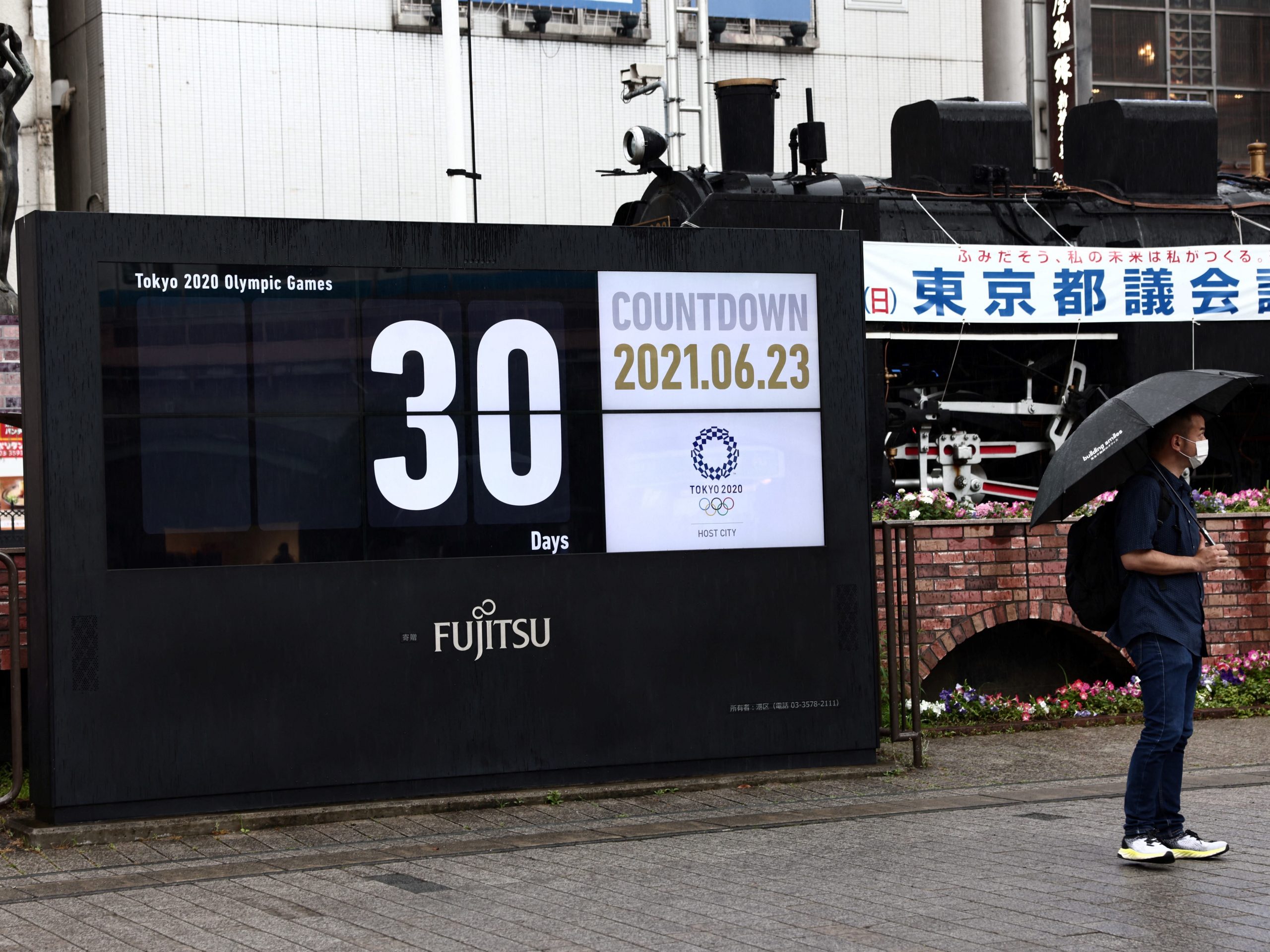 The countdown clock for the Tokyo 2020 Olympic Games is displayed, 30 days before the opening ceremony, in Tokyo, June 23, 2021.