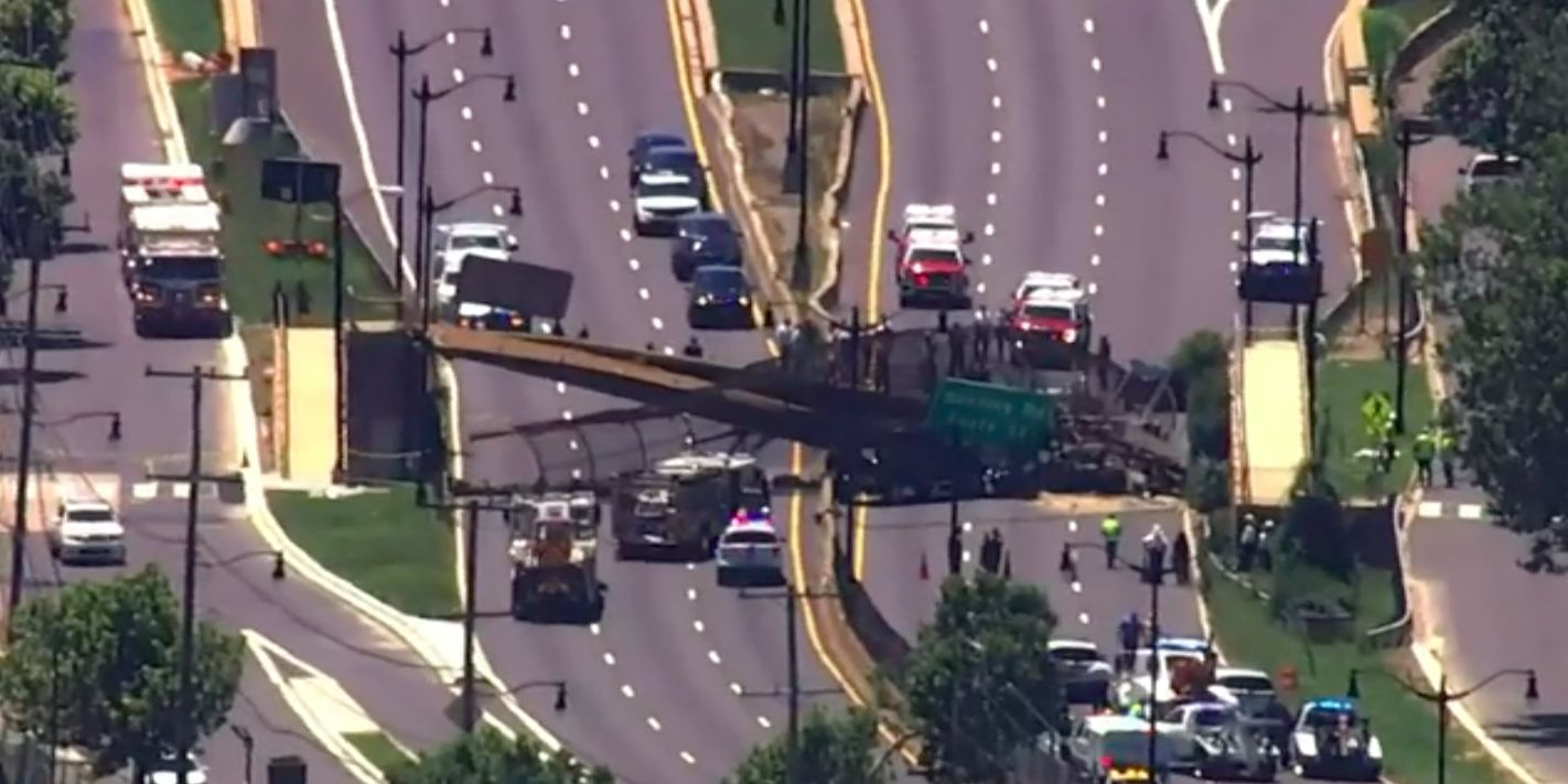 A pedestrian bridge collapsed on to a highway in Washington, DC.
