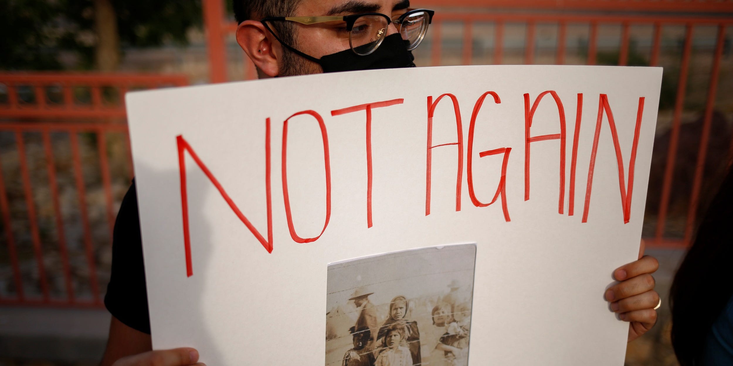 Activist defending the rights of migrants holds a protest near Fort Bliss to call for the end of the detention of unaccompanied minors at the facility in El Paso, Texas, U.S, June 8, 2021. REUTERS/Jose Luis Gonzalez