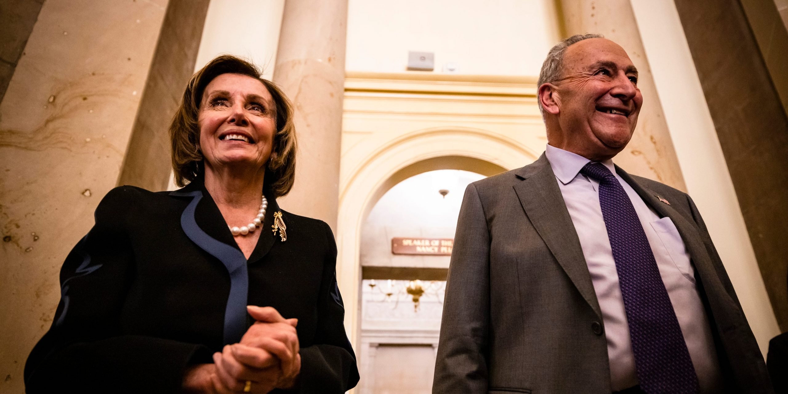 Nancy Pelosi Chuck Schumer in Capitol, smiling