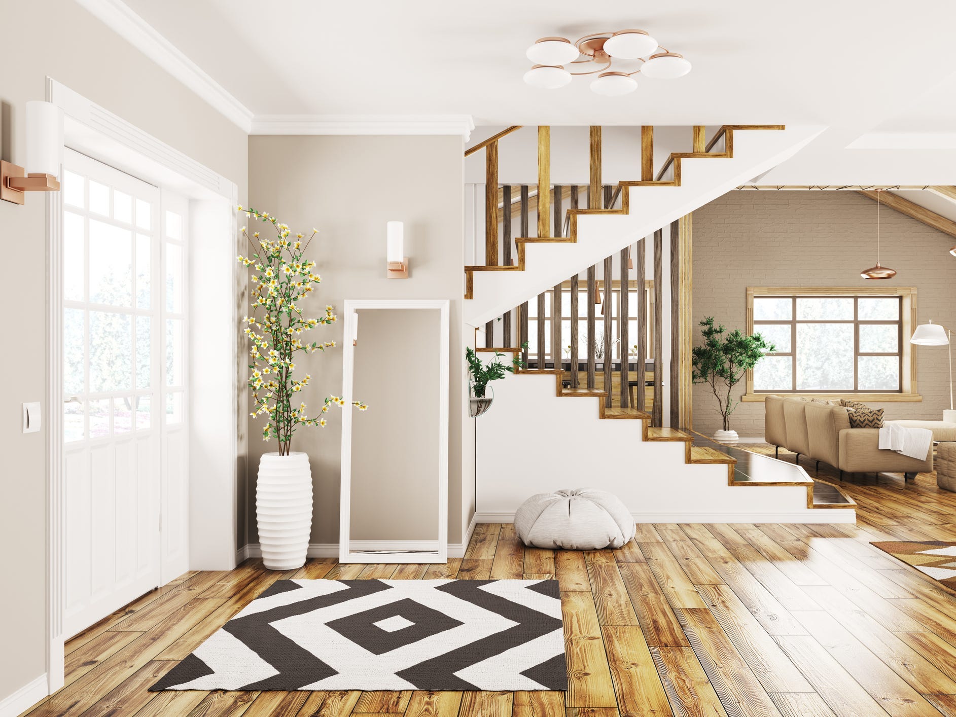 The interior of a home with while walls, wood floors, and a staircase up to two different levels