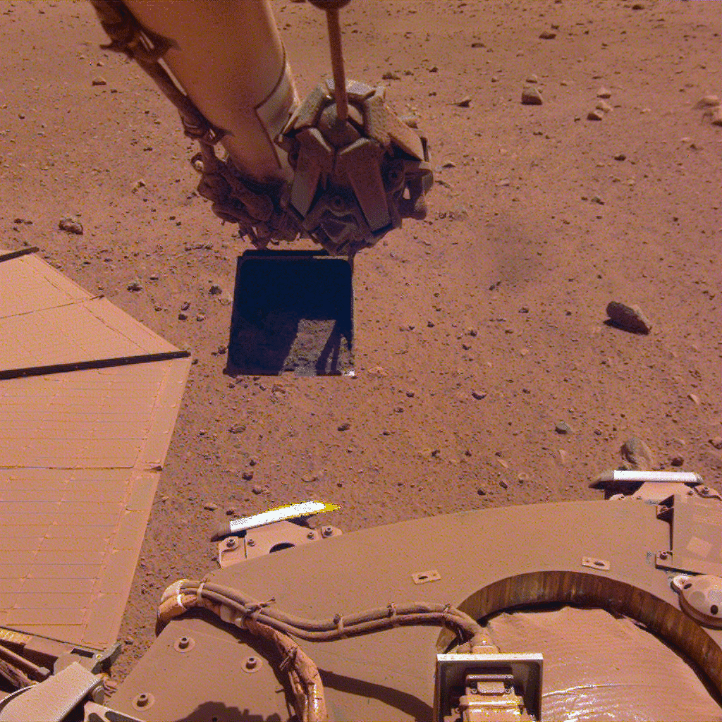 insight robotic arm scooping and trickling sand near solar panels gif