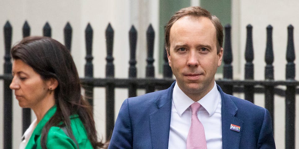 Health Secretary Matt Hancock leaves 10 Downing Street with aide Gina Coladangelo after the daily press briefing on May 01, 2020 in London, England