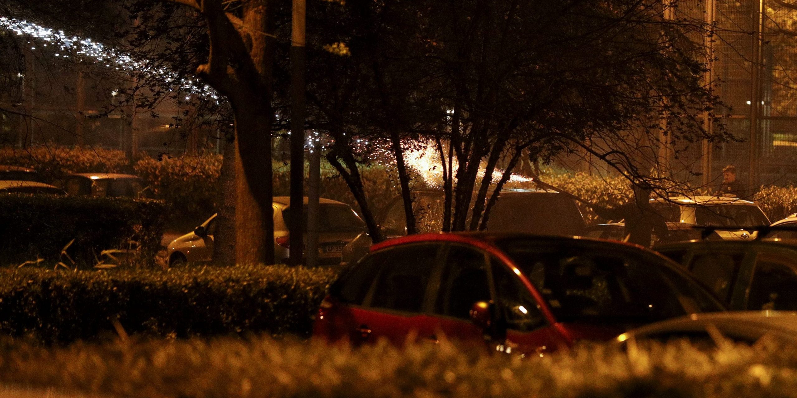 People fire fireworks during clashes in Villeneuve-la-Garenne, in the northern suburbs of Paris, on April 20, 2020. - Tension with the police erupted again on the evening of April 20 in Villeneuve-la-Garenne near Paris, where a motorcycle accident involving the police had provoked the first clashes with residents two days before.