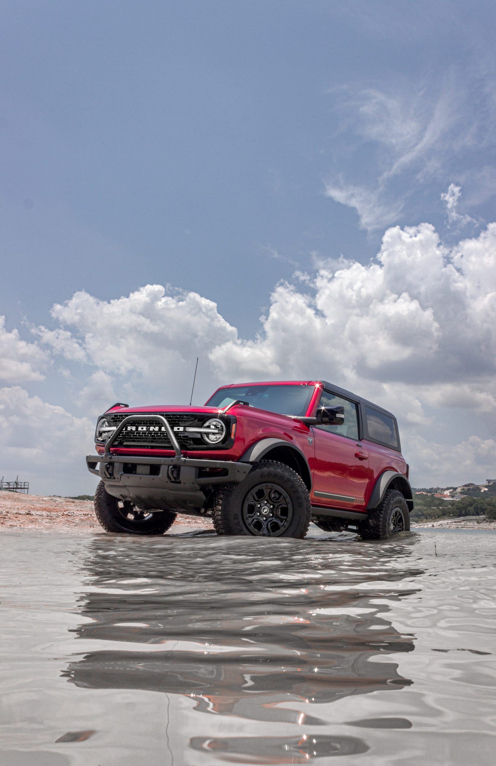 The Ford Bronco in a lake.