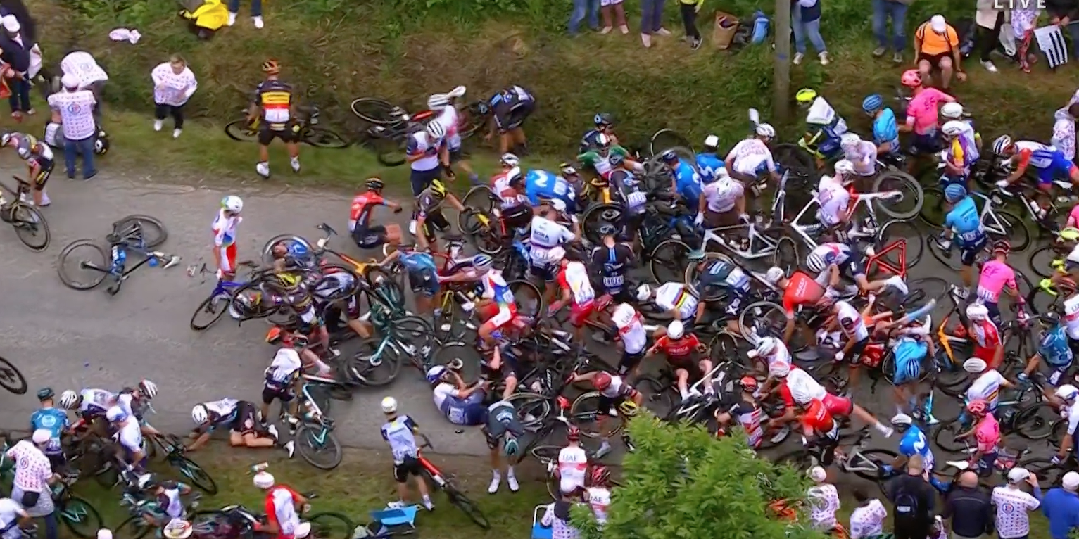 Fan with cardboard sign causes Tour de France crash