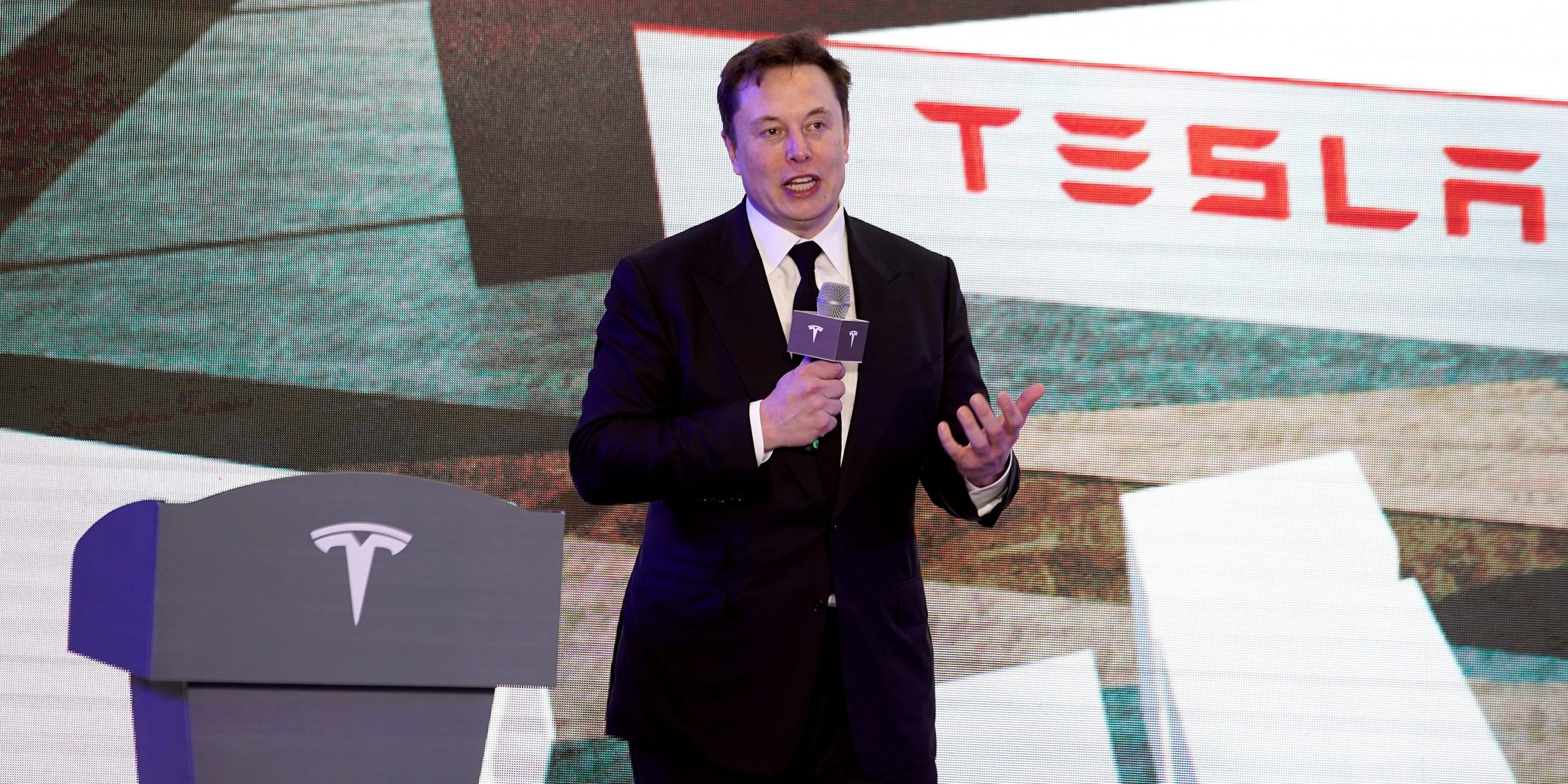 FILE PHOTO: Tesla Inc CEO Elon Musk speaks at an opening ceremony for Tesla China-made Model Y program in Shanghai, China January 7, 2020. REUTERS/Aly Song