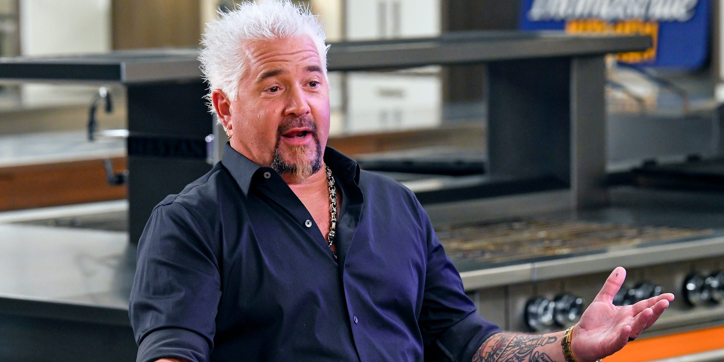 Guy Fieri speaks at Guy Fieri's Restaurant Reboot at The Culinary Institute of America in St Helena, California.