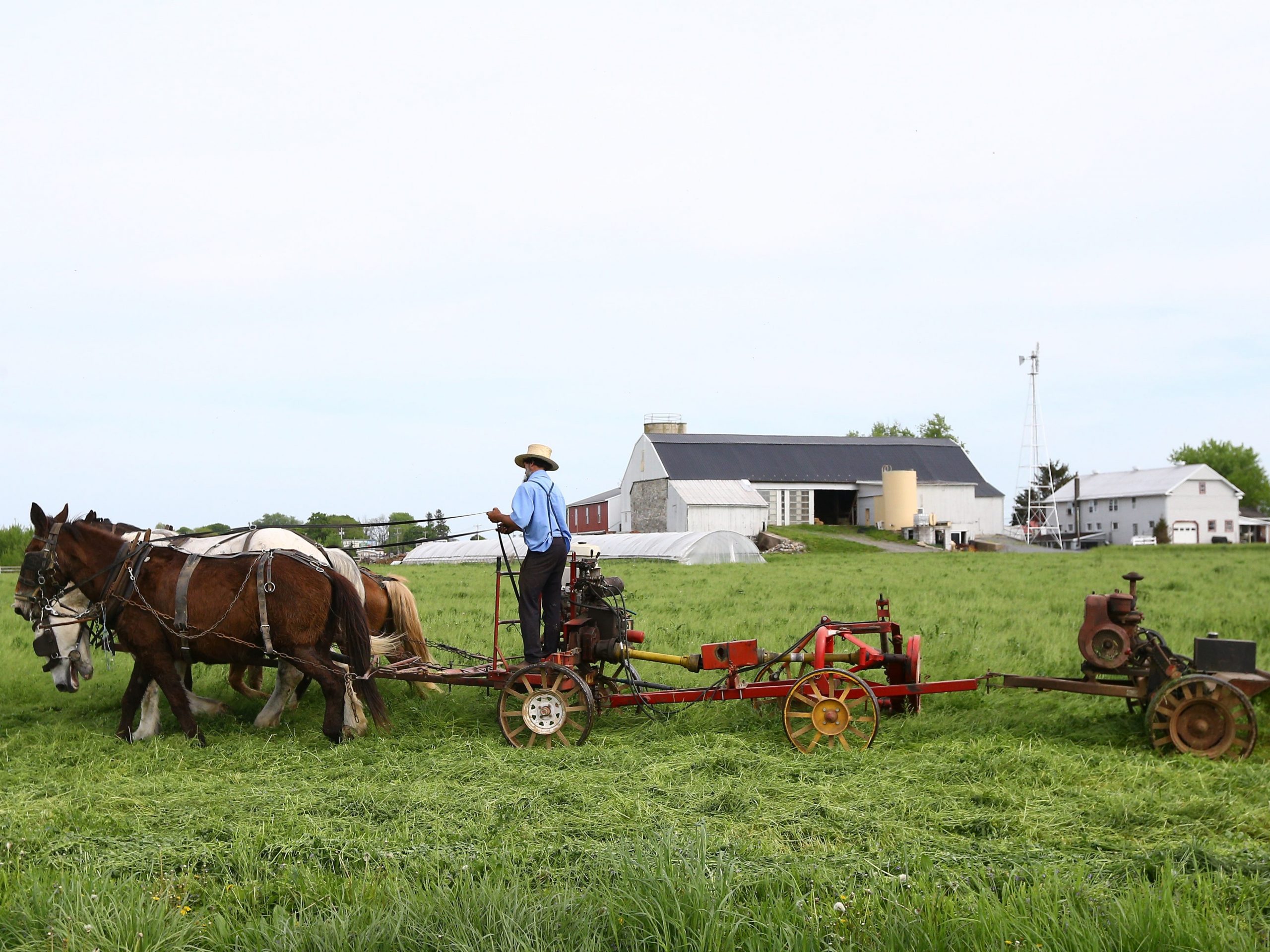 Amish farmer uses horsepower to plow the soil in Central Pennsylvania.