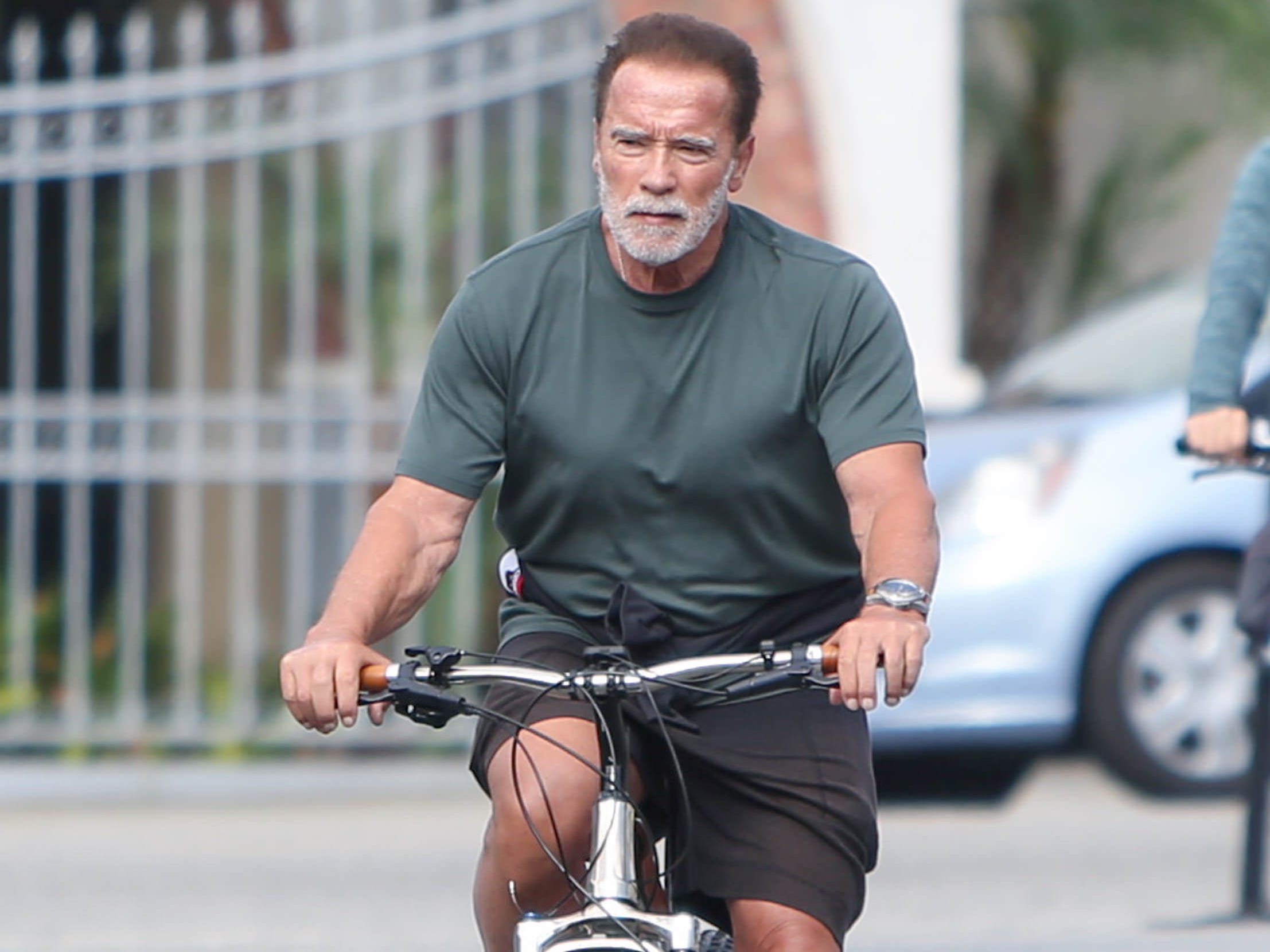 Arnold Schwarzenegger cycling in Los Angeles.
