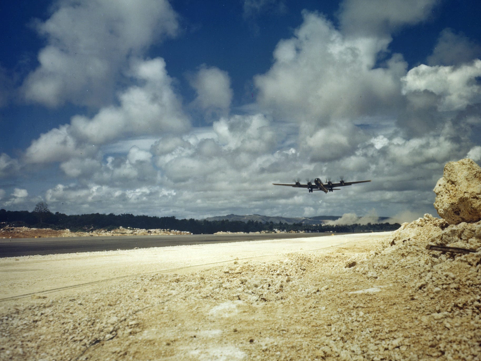 B-29 over runway at Harmon Field Guam during WWII