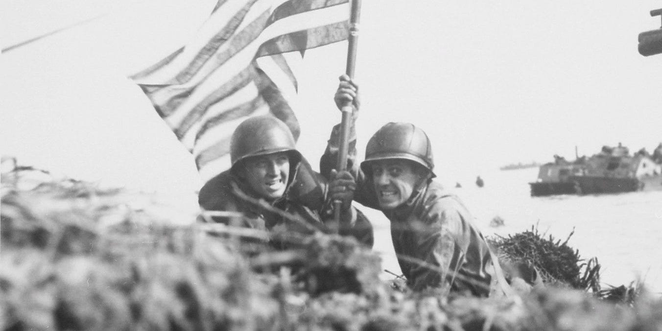 US troops plant US flag on Guam during WWII