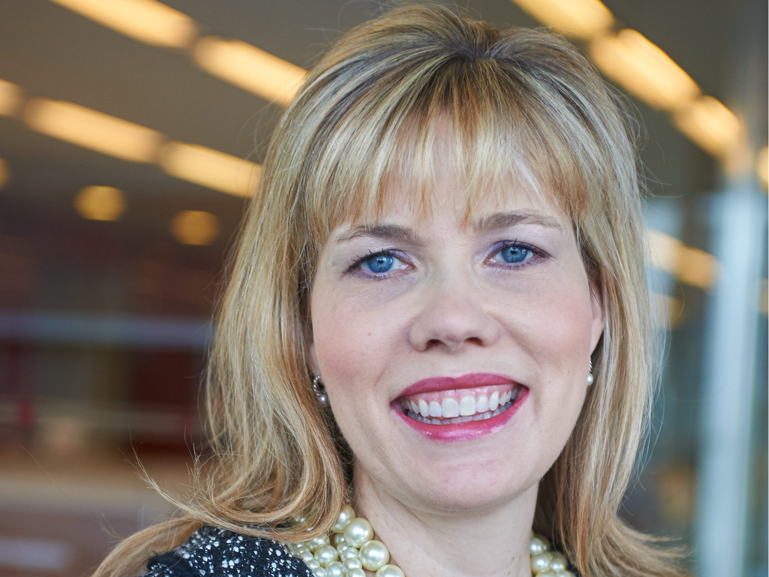 Liz Guthrie, Wells Fargo's head of innovation and R&D, smiles in her head shot.