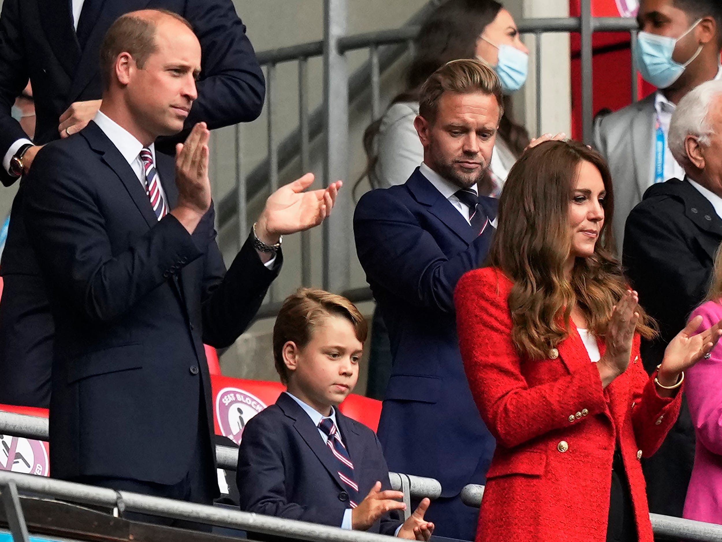 Prince William, Kate Middleton and Prince George at Wembley Stadium.