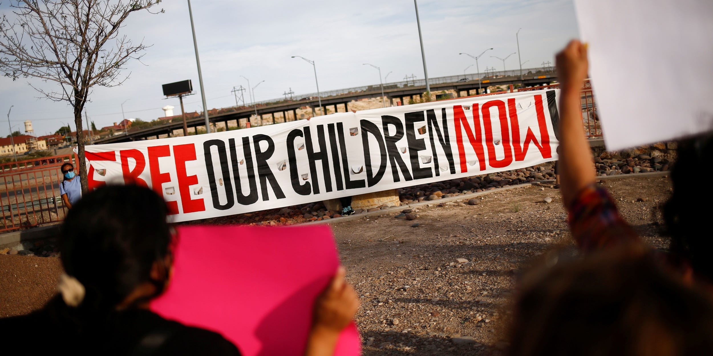 FILE PHOTO: Activists defending the rights of migrants hold a protest near Fort Bliss to call for the end of the detention of unaccompanied minors at the facility in El Paso, Texas, U.S, June 8, 2021.