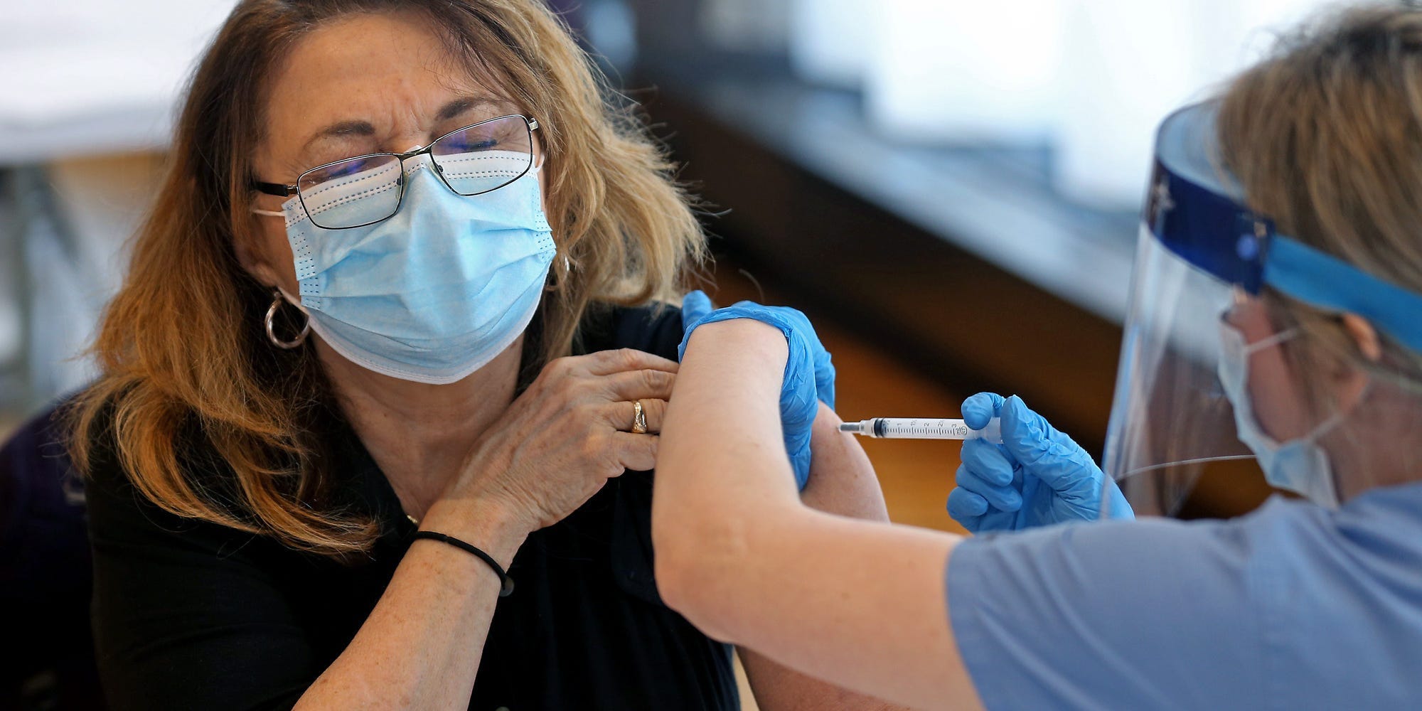 woman getting vaccine