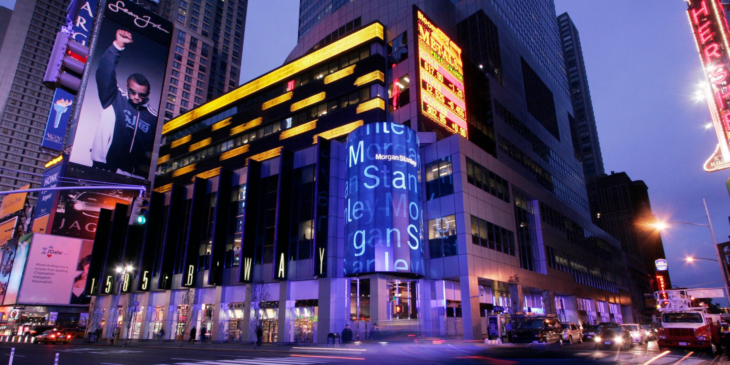 In this Dec. 19, 2006, file photo, traffic passes by a Morgan Stanley building in New York's Times Square.