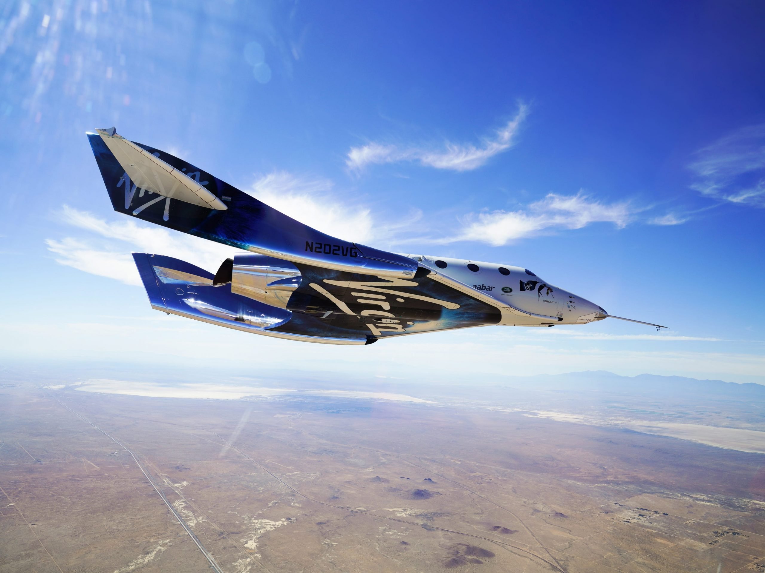 Een SpaceShipTwo-raketvliegtuig keert terug na een supersonische vlucht. Foto: Virgin Galactic