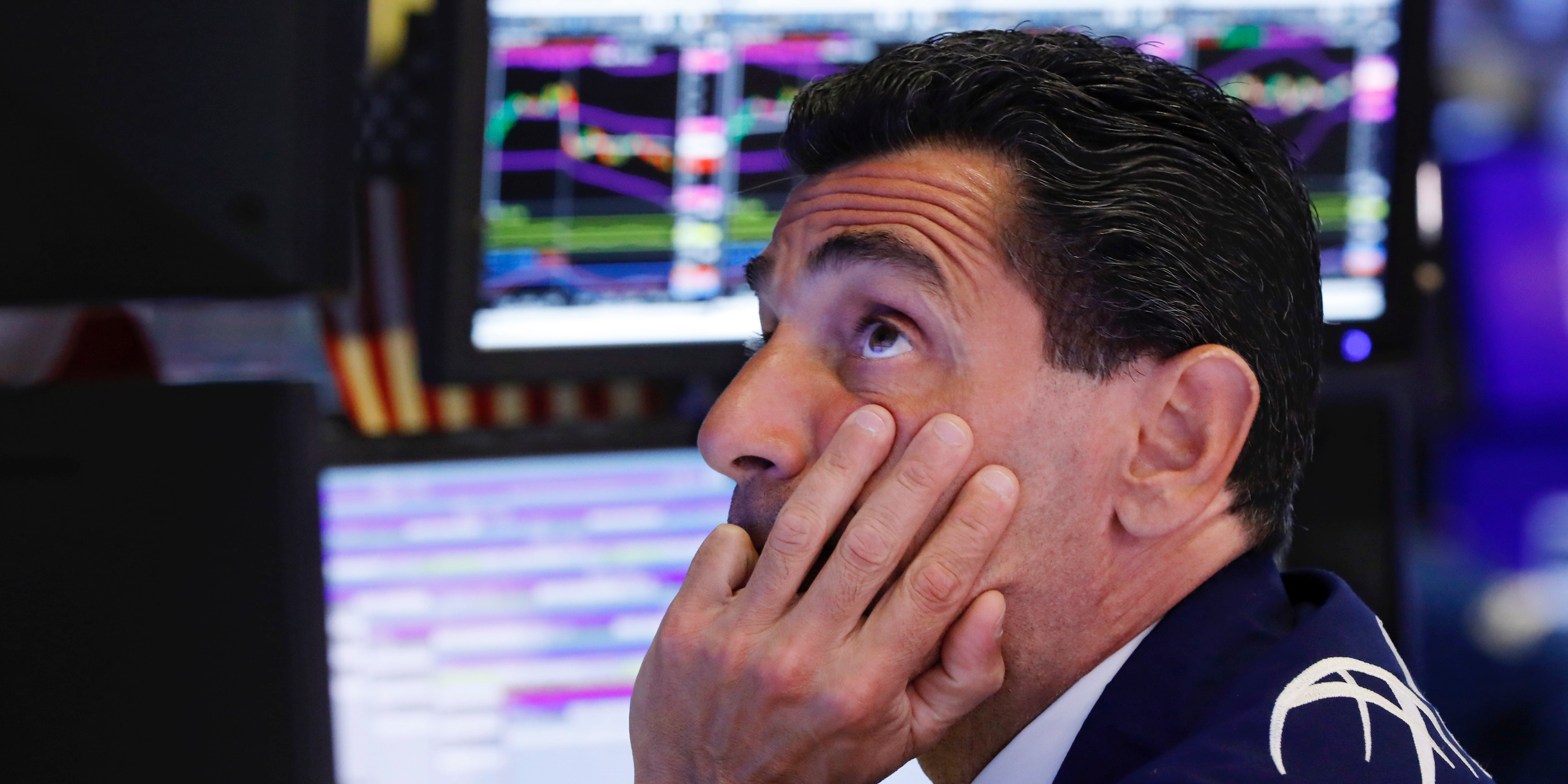 FILE - In this Aug. 12, 2019, photo specialist Peter Mazza works at his post on the floor of the New York Stock Exchange. Stocks of companies that do lots of business with China are obvious targets to sell when trade worries rise, and they’ve lagged sharply behind the rest of the market whenever President Donald Trump sends out a tariff tweet. But investors are also looking way beyond these first-order effects, as they pick out which stocks look most vulnerable to the trade war.