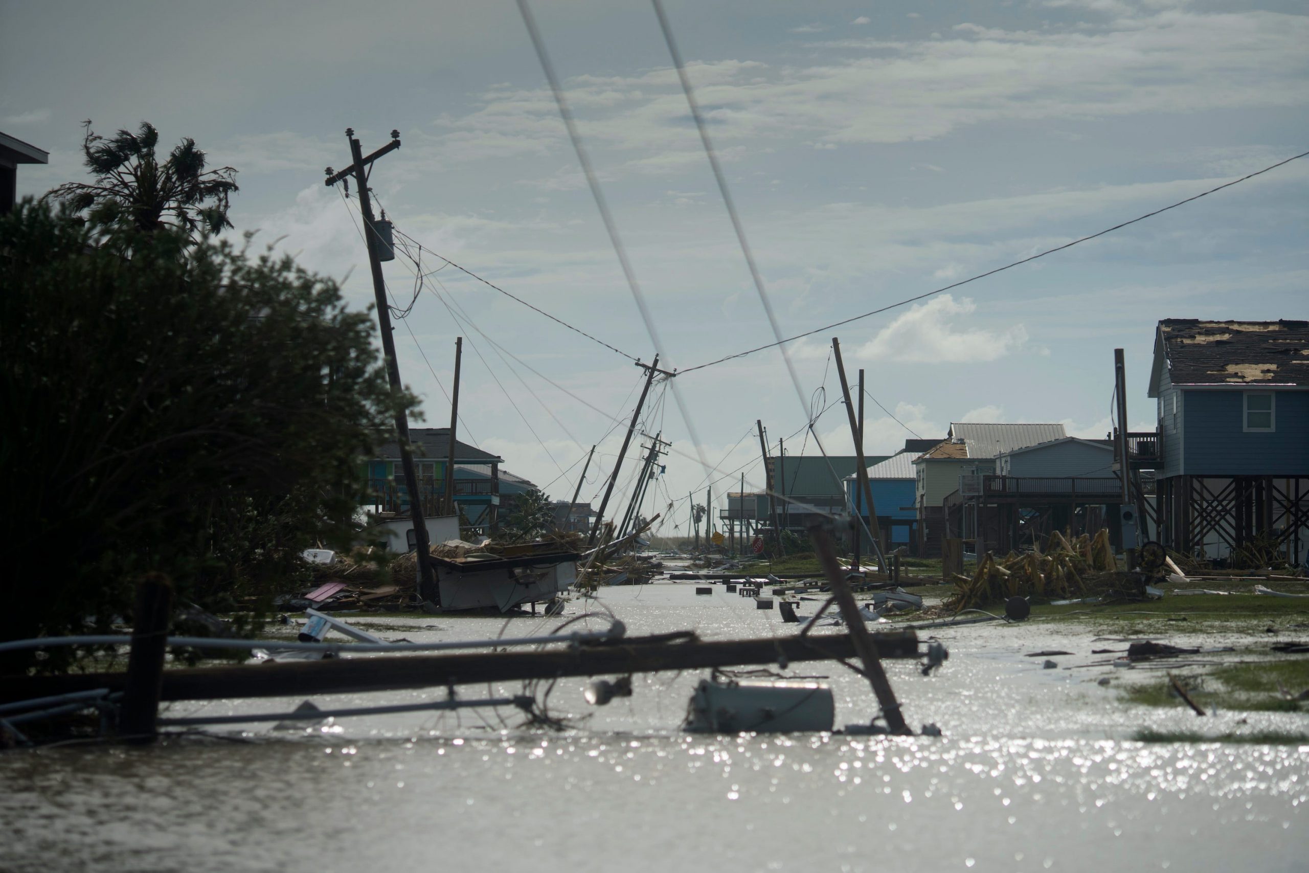 Damaged homes sit among flood water after Hurricane Laura.