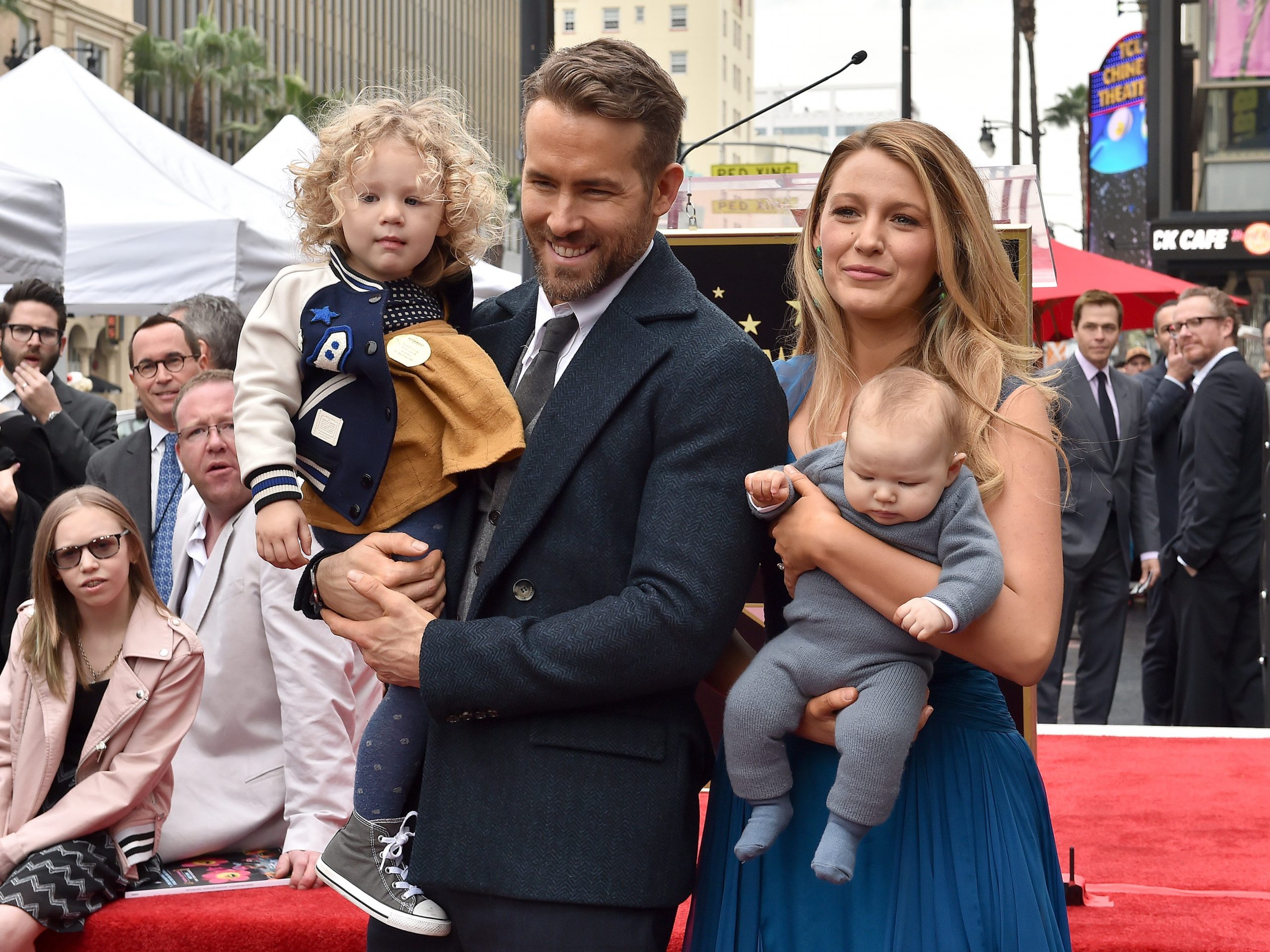 Ryan Reynolds and Blake Lively pose for snaps with newborn baby