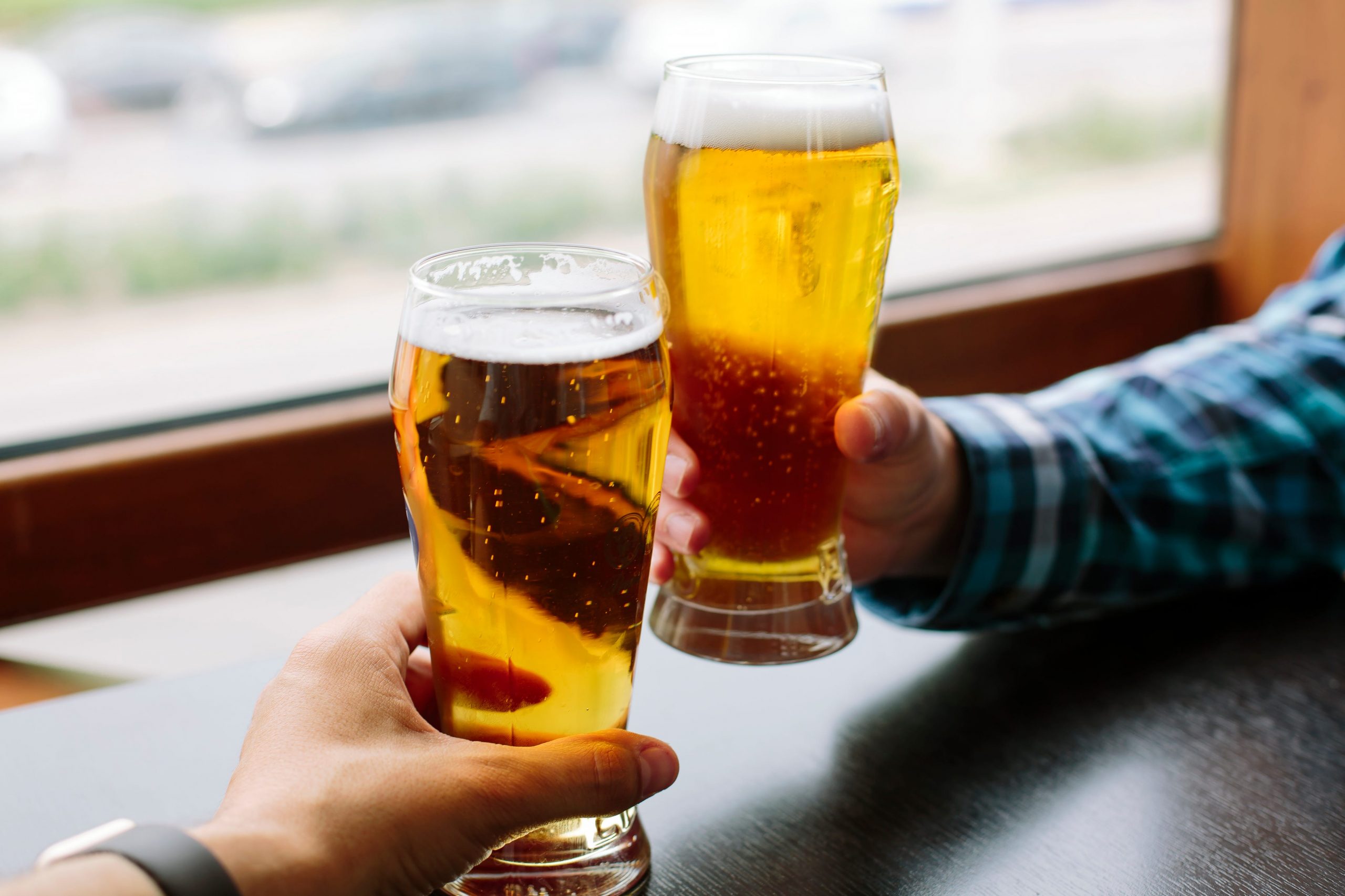 clinking beer glasses