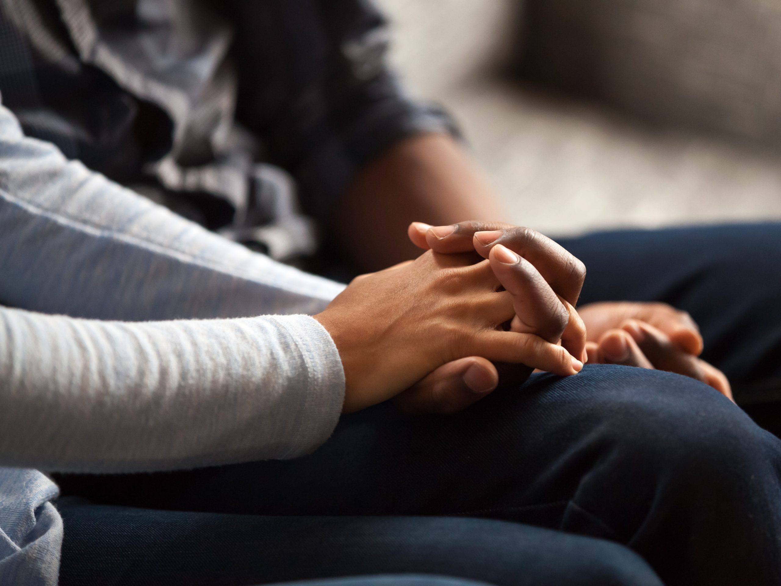 Couple holding hands