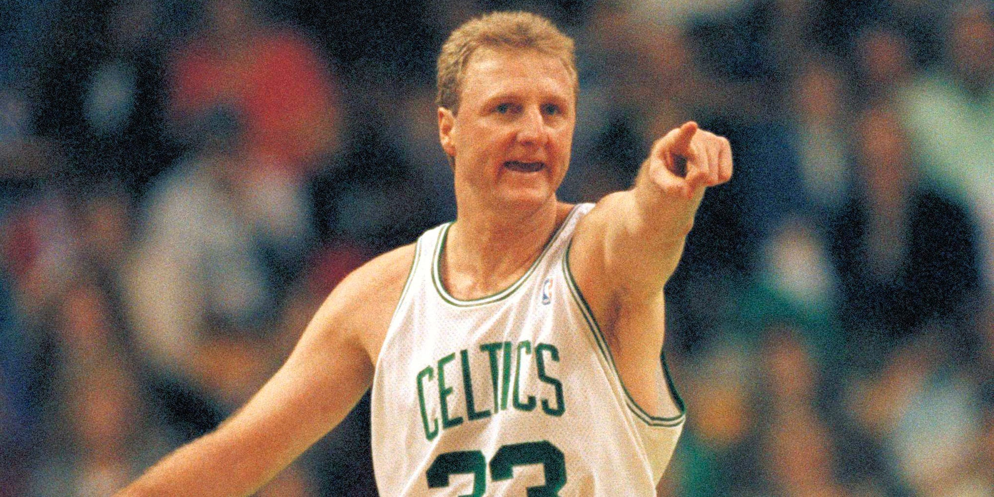 Larry Bird points during a Boston Celtics game in 1992.