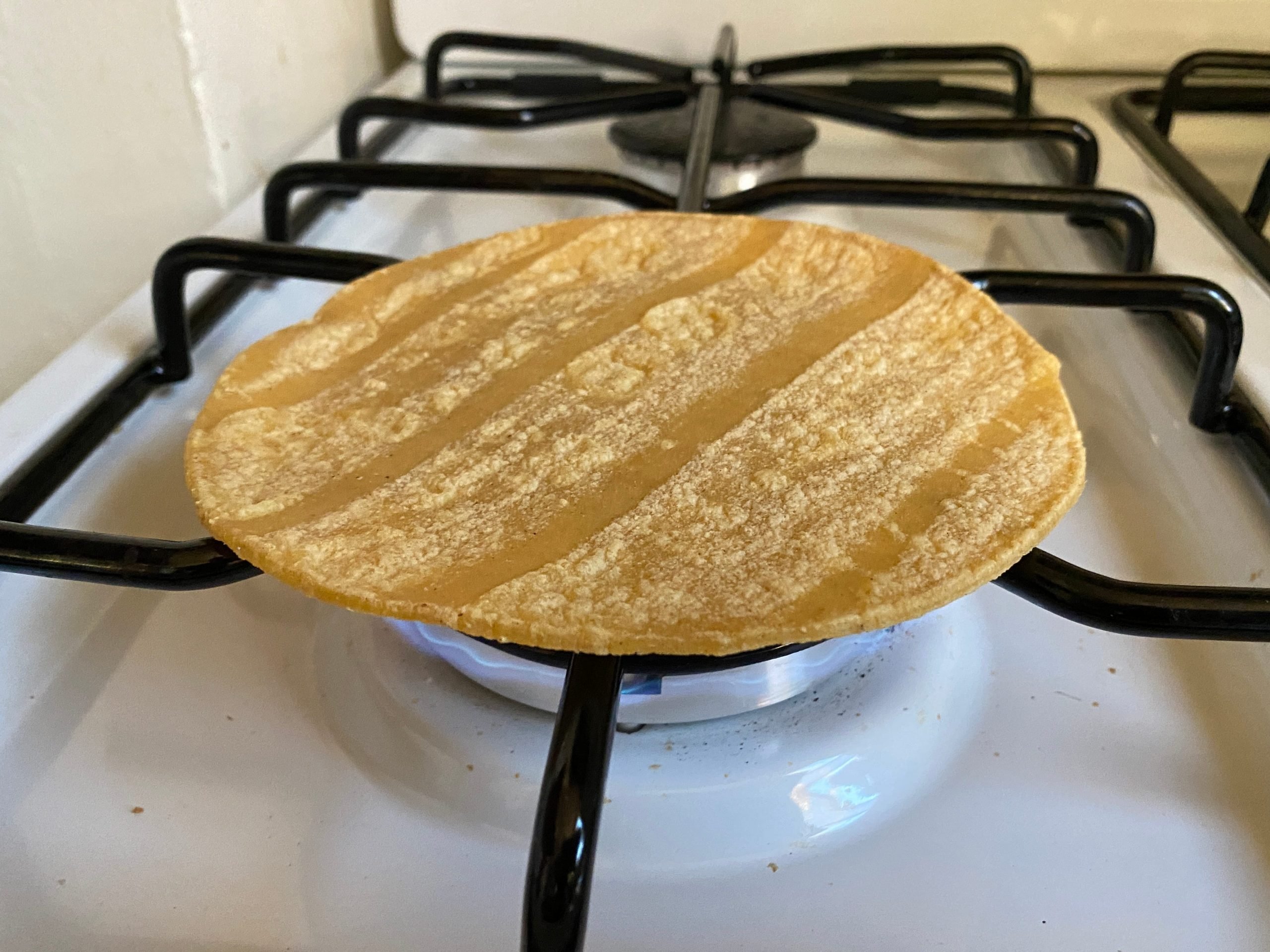 Tortilla on stove.