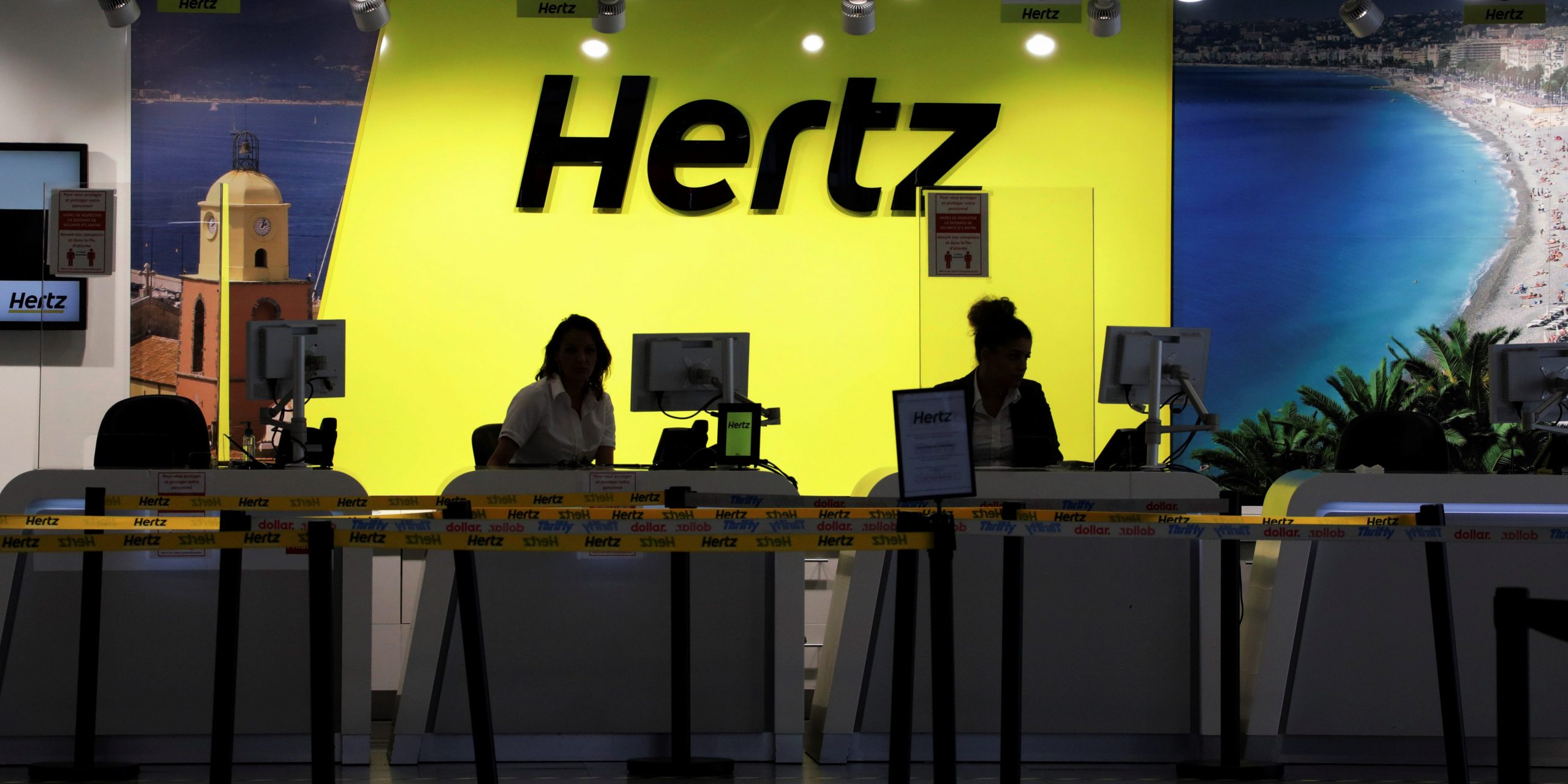 FILE PHOTO: The desk of car rental company Hertz is seen at Nice International airport during the coronavirus disease (COVID-19) outbreak in Nice, France, May 27, 2020. REUTERS/Eric Gaillard