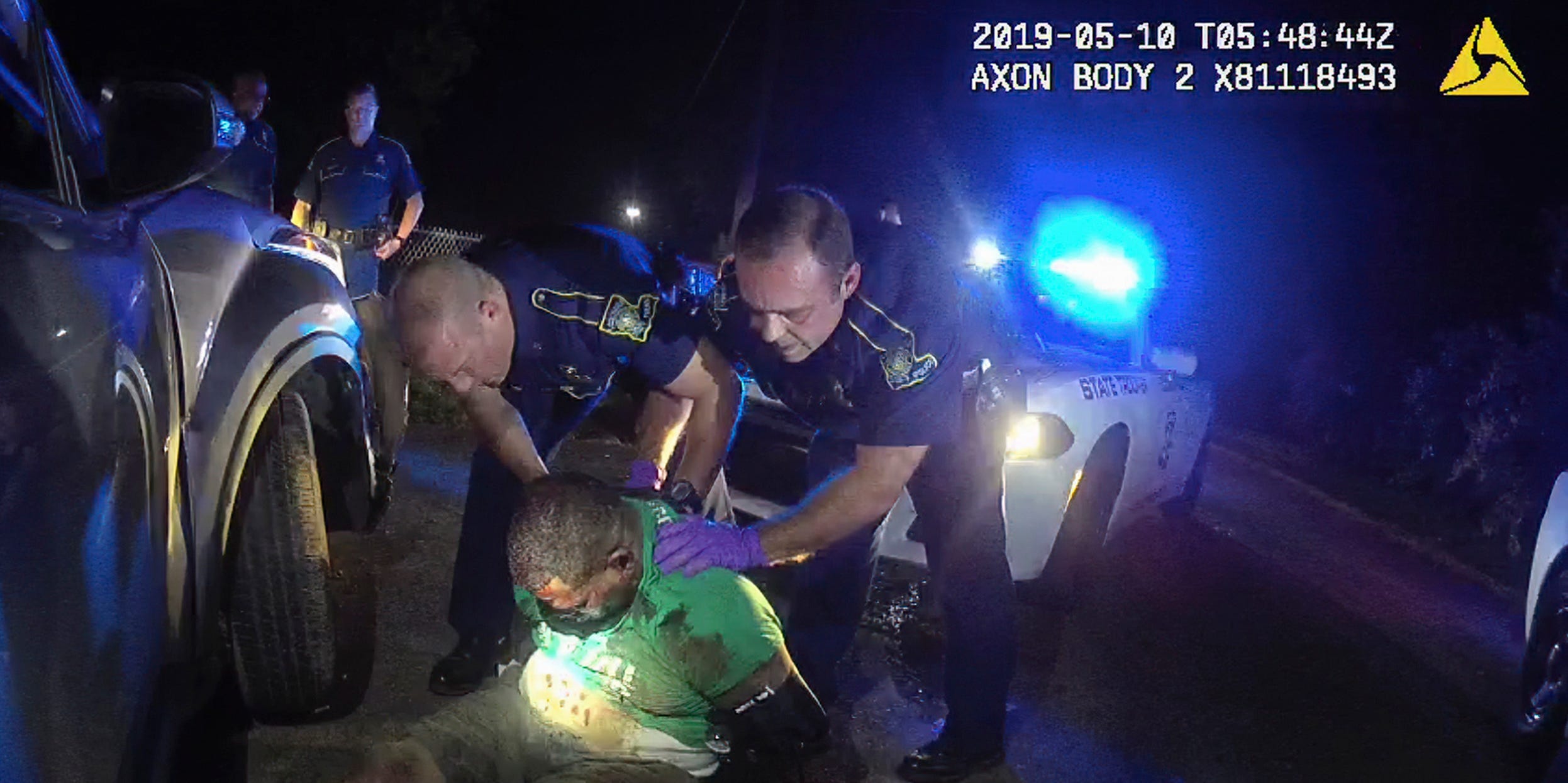 This image from video from Louisiana state police state trooper Dakota DeMoss' body-worn camera, shows troopers holding up Ronald Greene before paramedics arrived on May 10, 2019, outside of Monroe, Louisiana.