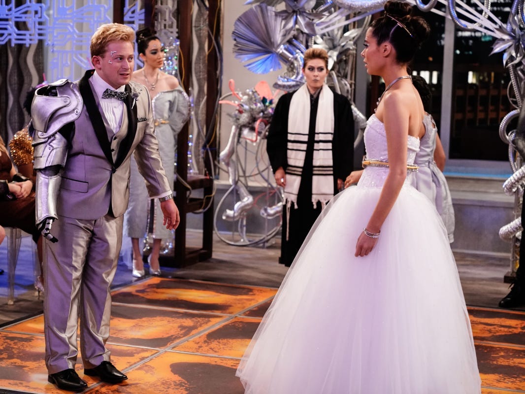 Reed Alexander wearing a silver suit and Miranda Cosgrove wearing a white wedding dress on episode five of the "iCarly" revival.