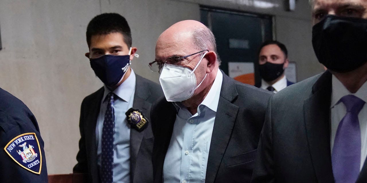 Allen Weisselberg (C) former US President Donald Trumps company chief financial officer arrives to attend the hearing for the criminal case at the criminal court in lower Manhattan in New York on July 1, 2021.