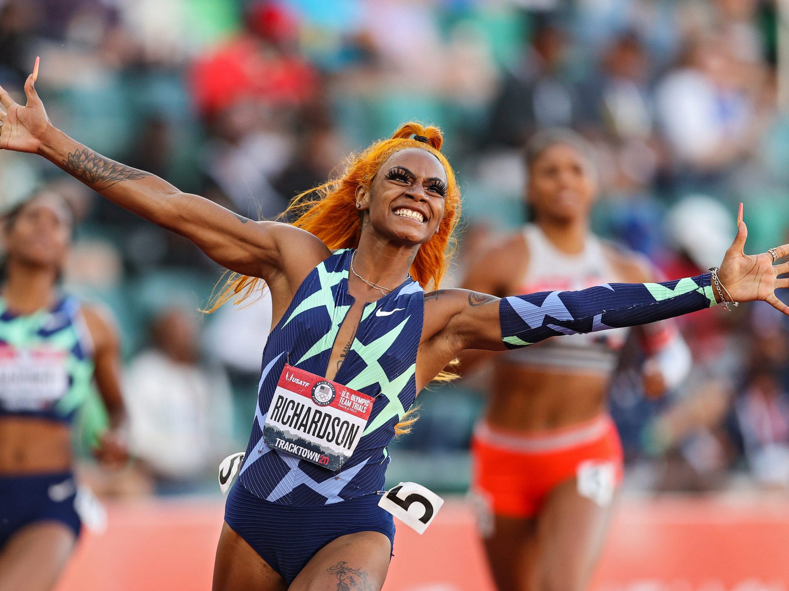 Sha'Carri Richardson celebrates winning the Women's 100 Meter final on day 2 of the 2020 U.S. Olympic Track & Field Team Trials