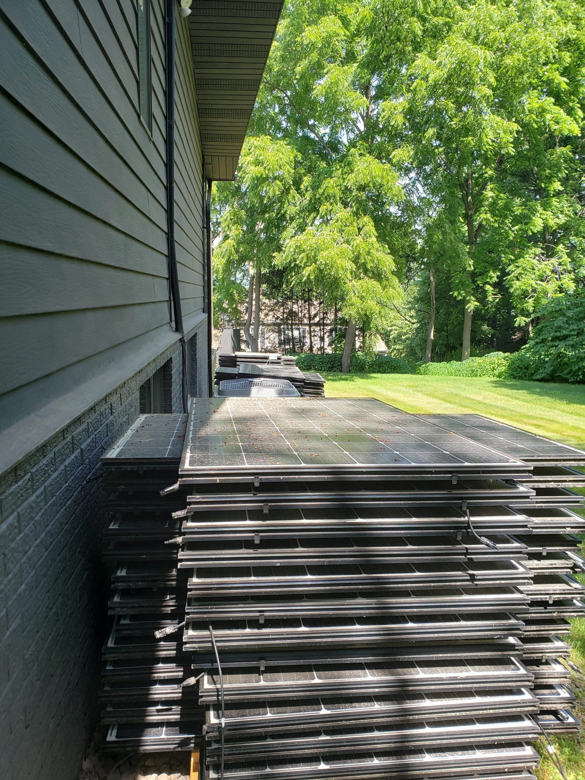 Tesla Solar panels lying in Jamie Fedorko's backyard.