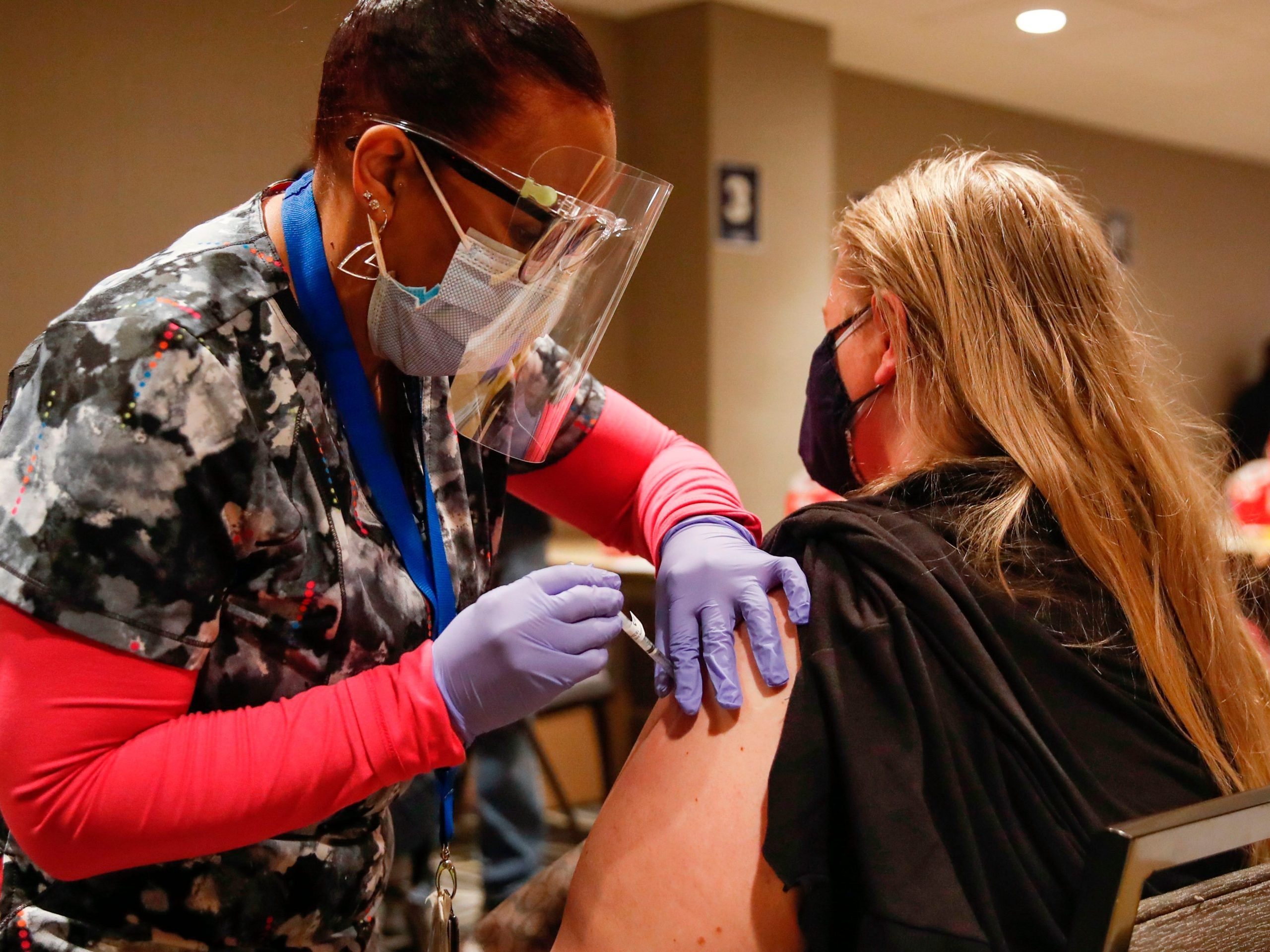 woman gets johnson & johnson vaccine